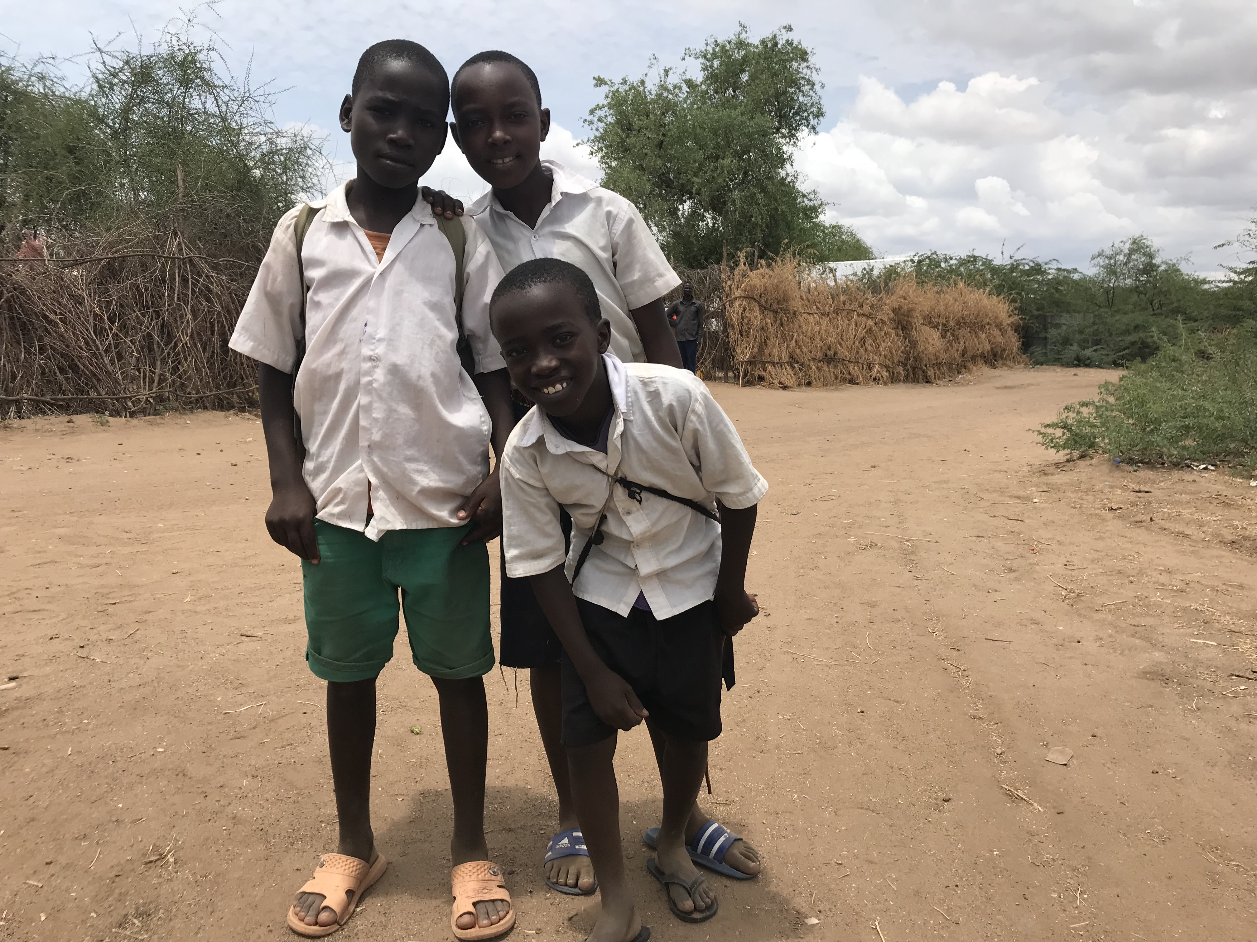 Kids at Kakuma refugee camp walk home from school. Image by Jaime Joyce. Kenya, 2018. Kids at Kakuma refugee camp walk home from school. Image by Jaime Joyce. Kenya, 2018.