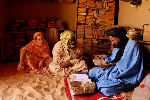 Stephanie Diakité, Abdel Kadel Haidara, and an elder from one of Mali’s ancient manuscript-holding families. Image by Stephanie Diakité. Mali, 2013.