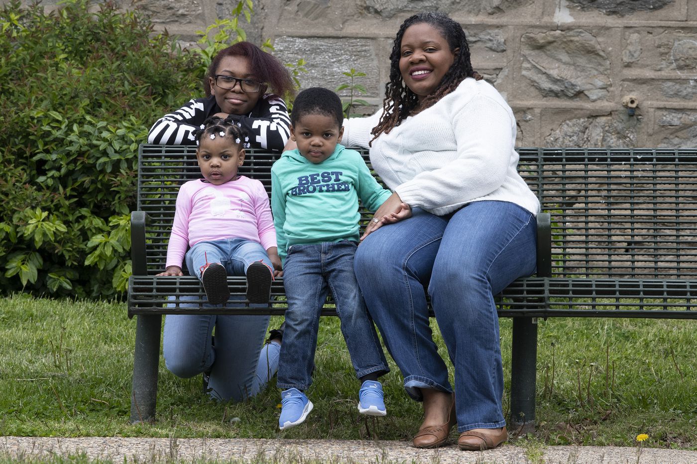 Kyana Hopkins-Thomas, right, is photographed with her kids, Imani Thomas, 15; Imara Thomas, 1; and Keion Thomas, 2, near their home in Philadelphia. Kyana is teacher who is juggling her students' needs with her own children. Image by Jose F. Moreno. United States, 2020. Kyana Hopkins-Thomas, right, is photographed with her kids, Imani Thomas, 15; Imara Thomas, 1; and Keion Thomas, 2, near their home in Philadelphia. Kyana is teacher who is juggling her students' needs with her own children. Image by Jose F. Moreno. United States, 2020.