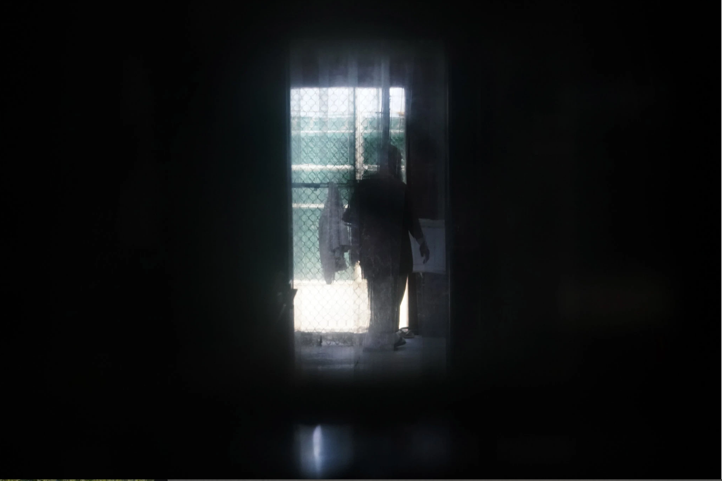 A prisoner at Guantánamo Bay’s Camp 6 detention center. Prisoners have been increasingly isolated at Guantánamo during the coronavirus pandemic. Image by Doug Mills / The New York Times. United States, undated. A prisoner at Guantánamo Bay’s Camp 6 detention center. Prisoners have been increasingly isolated at Guantánamo during the coronavirus pandemic. Image by Doug Mills / The New York Times. United States, undated.