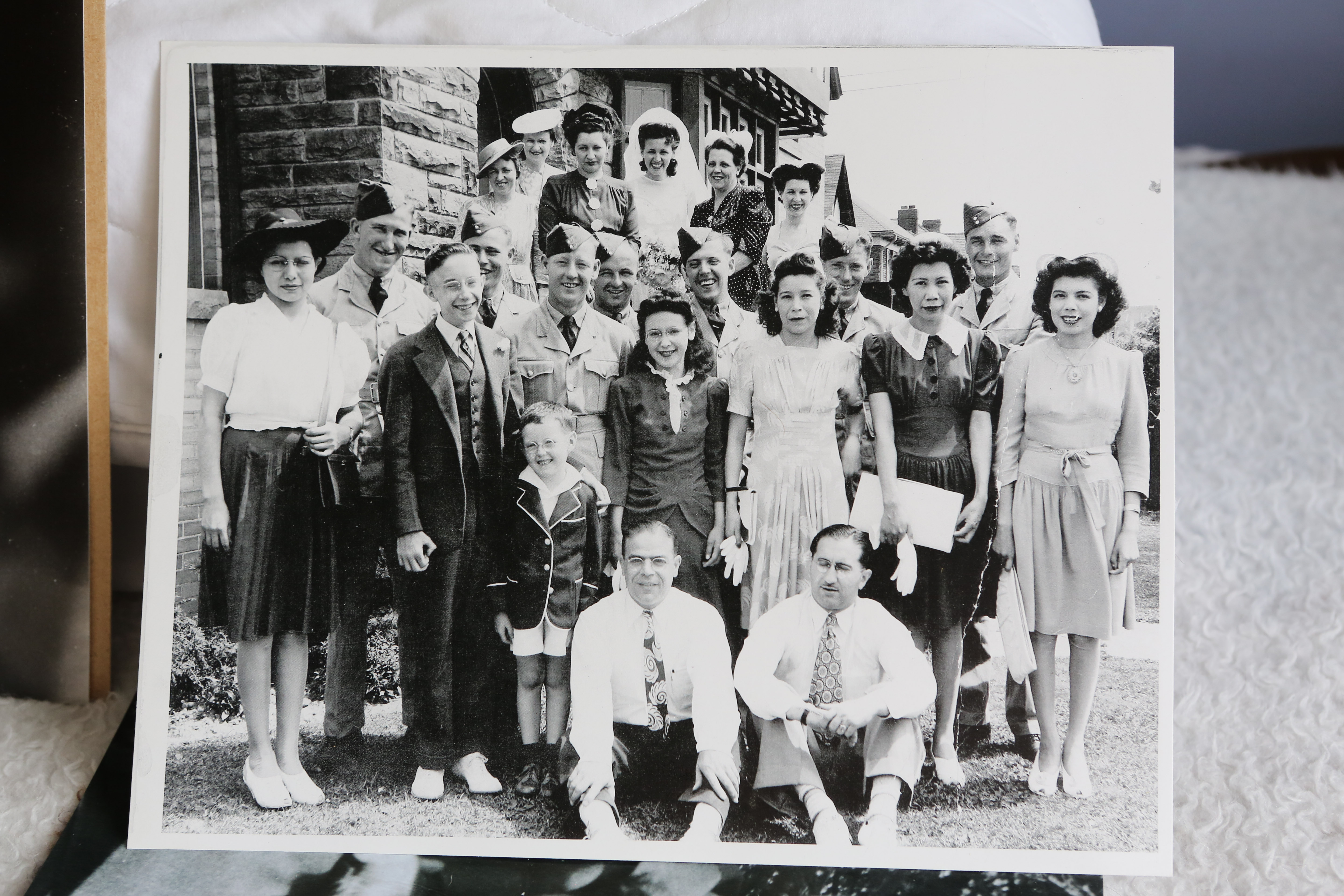 A photo of Doreen Bellaire's mother, Delina Commana (center), who attended a residential school in Spanish, Ontario for ten years. To protect her own family from ever having to go through the same experience, Delina left her reserve and moved into town to raise her children, never even telling them that they were First Nations. It wasn't until decades later that Doreen found out about her culture and her heritage. Image by Daniella Zalcman. Canada, 2015. Media file: daniellazalcman-soyi-130.jpg