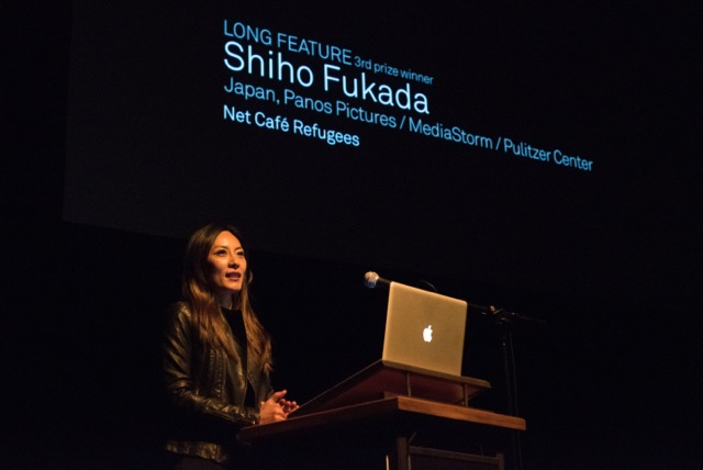 Shiho Fukada presenting at World Press Photo ceremony. Netherlands, 2015. Media file: _kdb4249.png