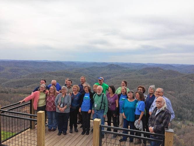 Residents of Leverett and Letcher County, Kentucky pose for a photo together at Hogg Mountain at the end of their four-day visit together. Image by Richie Davis. United States, 2018. Residents of Leverett and Letcher County, Kentucky pose for a photo together at Hogg Mountain at the end of their four-day visit together. Image by Richie Davis. United States, 2018.