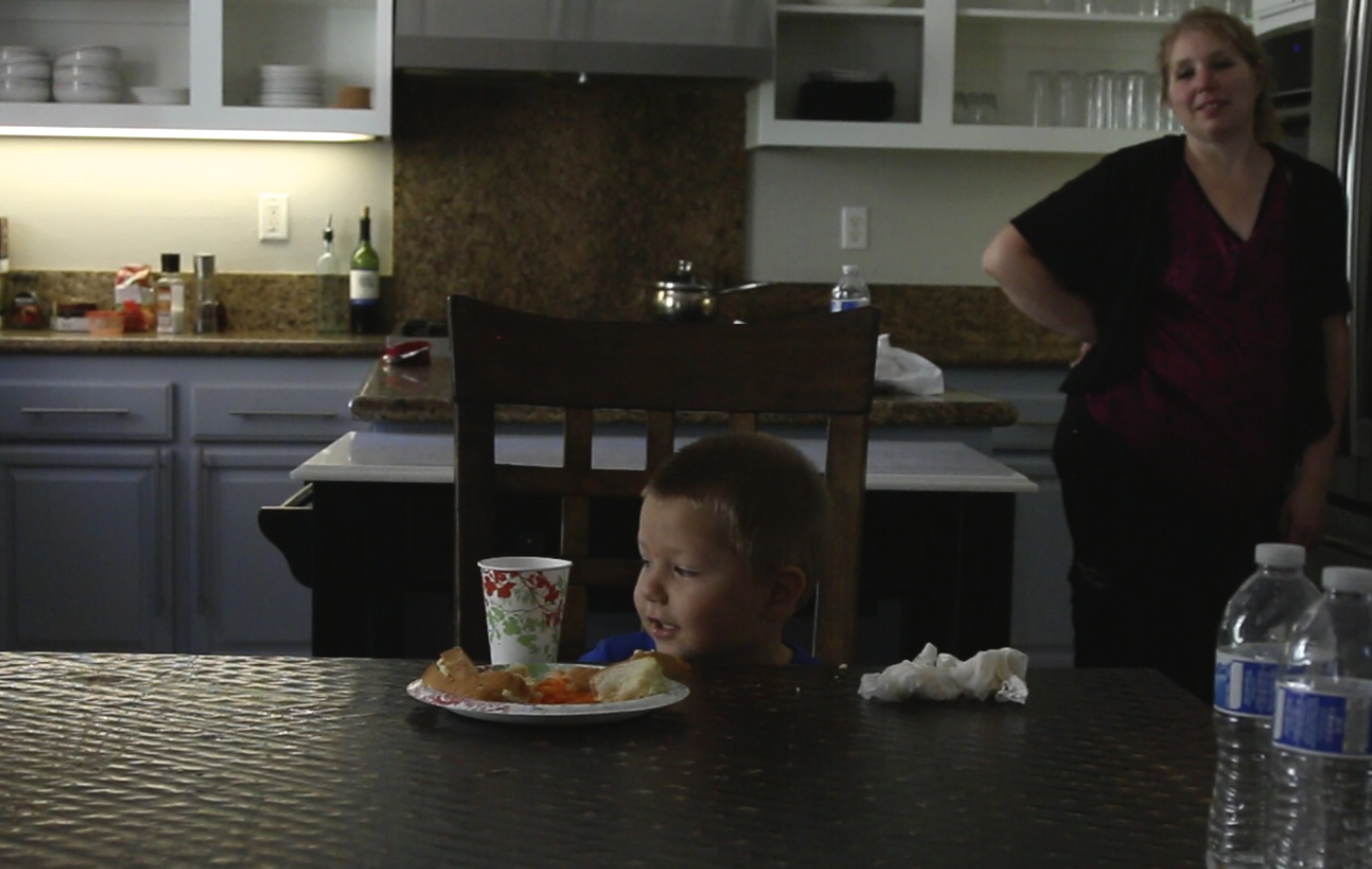 Three-year-old Lucian Olivera enjoys a meal at home. He was inflicted with a rare polio-like illness when he was 11 months old, leaving both of his legs paralyzed. Image by Jake Nicol. California. Media file: screen_shot_2015-05-05_at_10.26.28_am_3.jpg