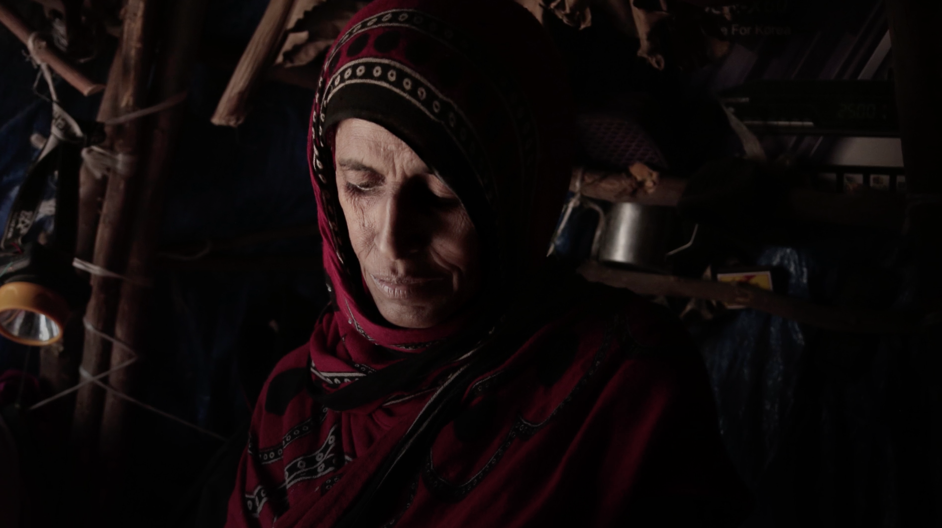 Meet Hagar Yahia, a Yemeni woman working to keep her family alive. Image by Nariman El Mofty. Yemen, 2018. Meet Hagar Yahia, a Yemeni woman working to keep her family alive. Image by Nariman El Mofty. Yemen, 2018.