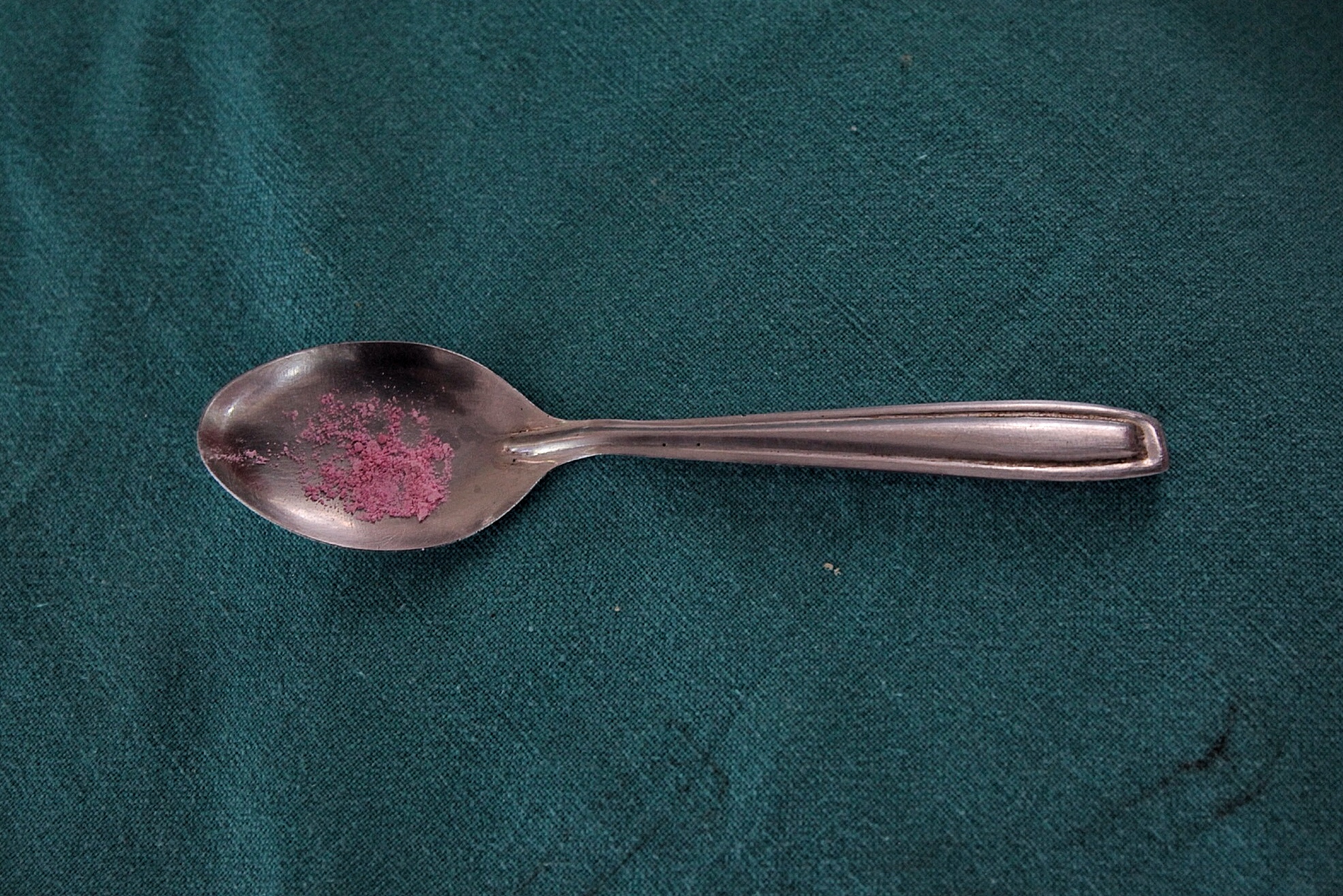 A crushed morphine pill is pictured on a spoon at a palliative care clinic in Kerala, India. Image by Atish Patel. India, 2015. Media file: image_8.jpg