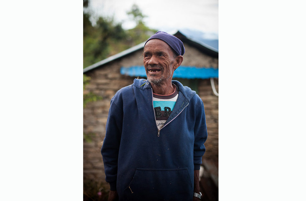 Many Nepalis, such as this man from the village of Kaskikot, expect their teeth to fall out with old age. Image by John Healey. Nepal, 2013. Media file: jmiller.jpg