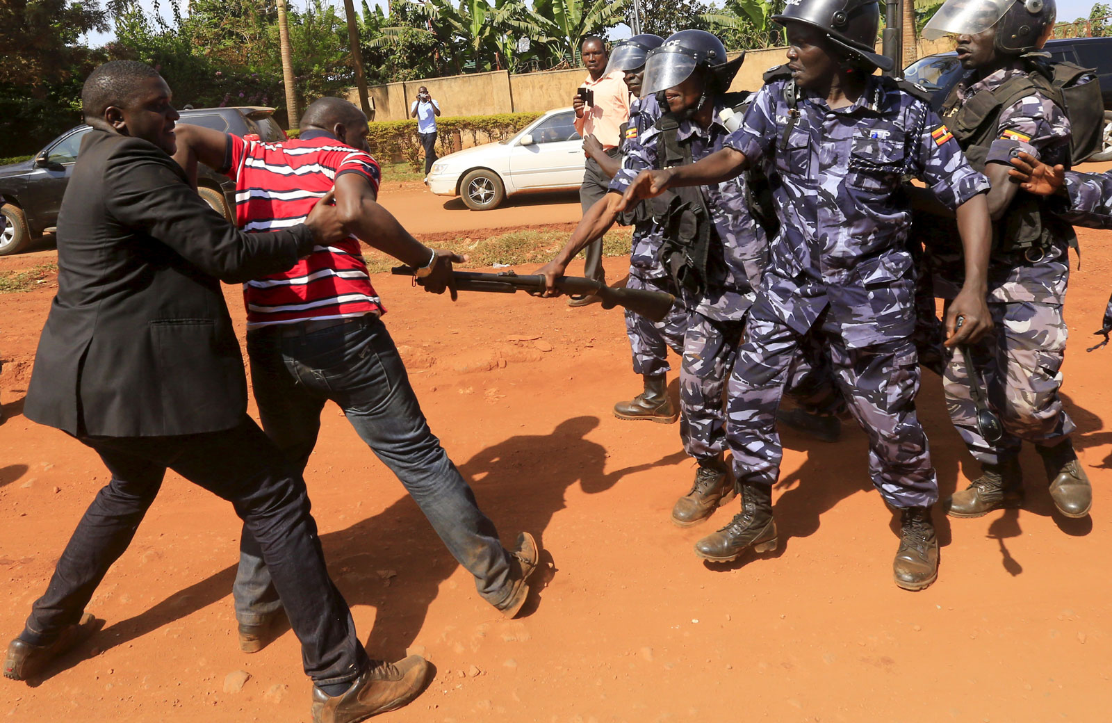 Riot police dispersing a gathering of opposition supporters in Jinja, eastern Uganda. Image by James Akena/Reuters/Corbis. Uganda, 2015. Media file: uganda-police.jpg