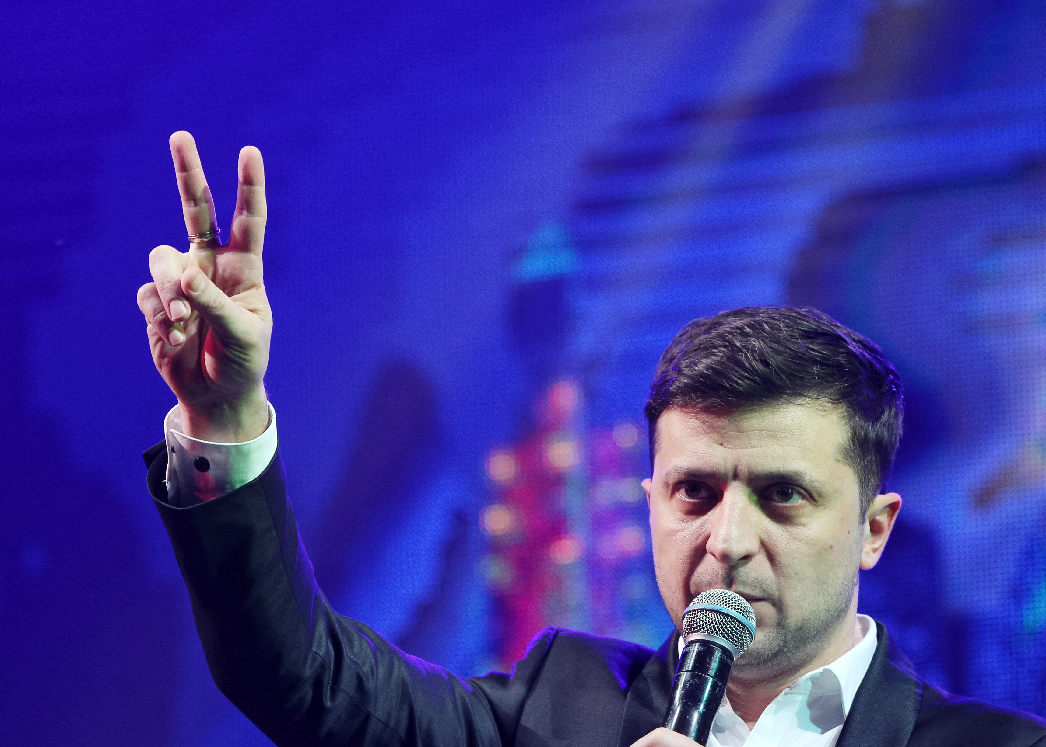 Ukrainian President-elect Volodymyr Zelenskiy shows victory sign during a comedy show at a concert hall in Brovary. Ukraine, 2019. Image by Shutterstock. Ukrainian President-elect Volodymyr Zelenskiy shows victory sign during a comedy show at a concert hall in Brovary. Ukraine, 2019. Image by Shutterstock.