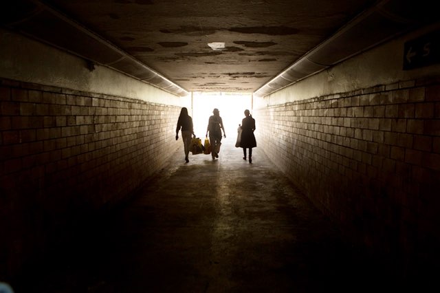 Filipino au pairs walk back to the train after shopping at a weekend flea market in Copenhagen. Denmark hosts around 1,600 Filipino au pairs each year, more than any other country. Image by Allison Shelley. Denmark, 2017. Filipino au pairs walk back to the train after shopping at a weekend flea market in Copenhagen. Denmark hosts around 1,600 Filipino au pairs each year, more than any other country. Image by Allison Shelley. Denmark, 2017.
