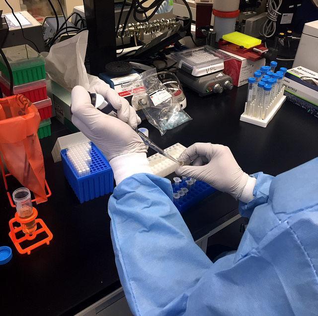 A Zika virus researcher at the NIAID Vaccine Research Center pipets samples. Photo courtesy of NIAID. Media file: 26546330560_90b7553620_z.jpg