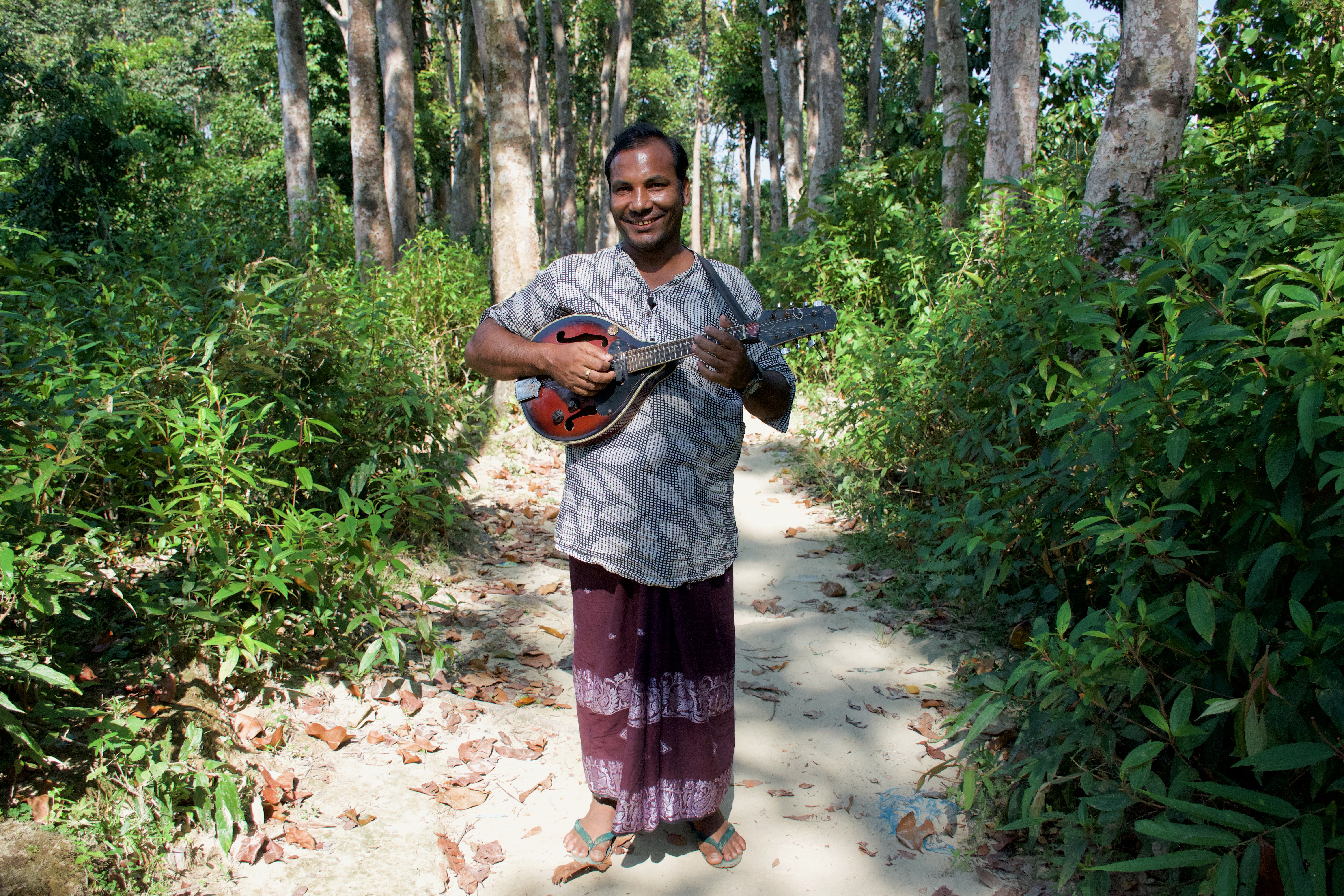 Soyedul Amin used to play music at weddings in Myanmar. He fled after being beaten and imprisoned. Image by Sasha Ingber. Bangladesh, 2019. Soyedul Amin used to play music at weddings in Myanmar. He fled after being beaten and imprisoned. Image by Sasha Ingber. Bangladesh, 2019.