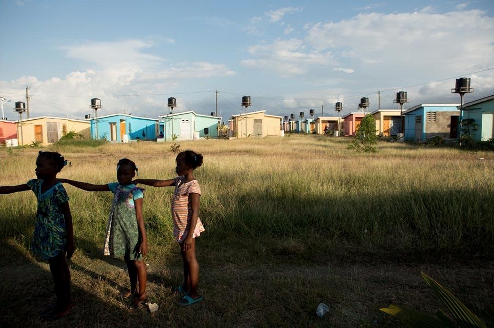 Third graders practice a marching drill after school in preparation for a Flag Day ceremony planned for May 18 in the village of La Difference. Image by Allison Shelley. Haiti, 2015.
