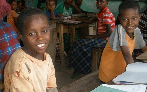 15-year-old Hirgaso (left) has suffered the consequences of the 2003 famine. Image from TheTelegraph.co.uk. Media file: thurow1_2571406b.jpg