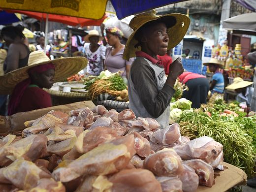 Imported chicken parts are sold in a Port-au-Prince market. Image by Larry McCormack. Haiti, 2016. Media file: 22.jpg