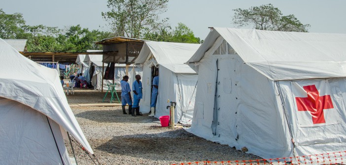 An Ebola treatment center run by the Red Cross and Red Crescent Societies in Sierra Leone. It contained zero patients in February. Hundreds of millions in donations went to the construction and operation of NGO-run centers in the three hard-hit countries. Image by Amy Maxmen. Sierra Leone, 2015. An Ebola treatment center run by the Red Cross and Red Crescent Societies in Sierra Leone. It contained zero patients in February. Hundreds of millions in donations went to the construction and operation of NGO-run centers in the three hard-hit countries. Image by Amy Maxmen. Sierra Leone, 2015.