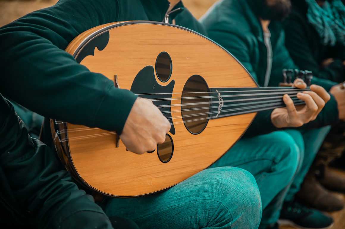 A musician plays an oud, a traditional Middle Eastern instrument. Image by Nayef Hammouri / Shutterstock. Palestinian Territories, undated. A musician plays an oud, a traditional Middle Eastern instrument. Image by Nayef Hammouri / Shutterstock. Palestinian Territories, undated.