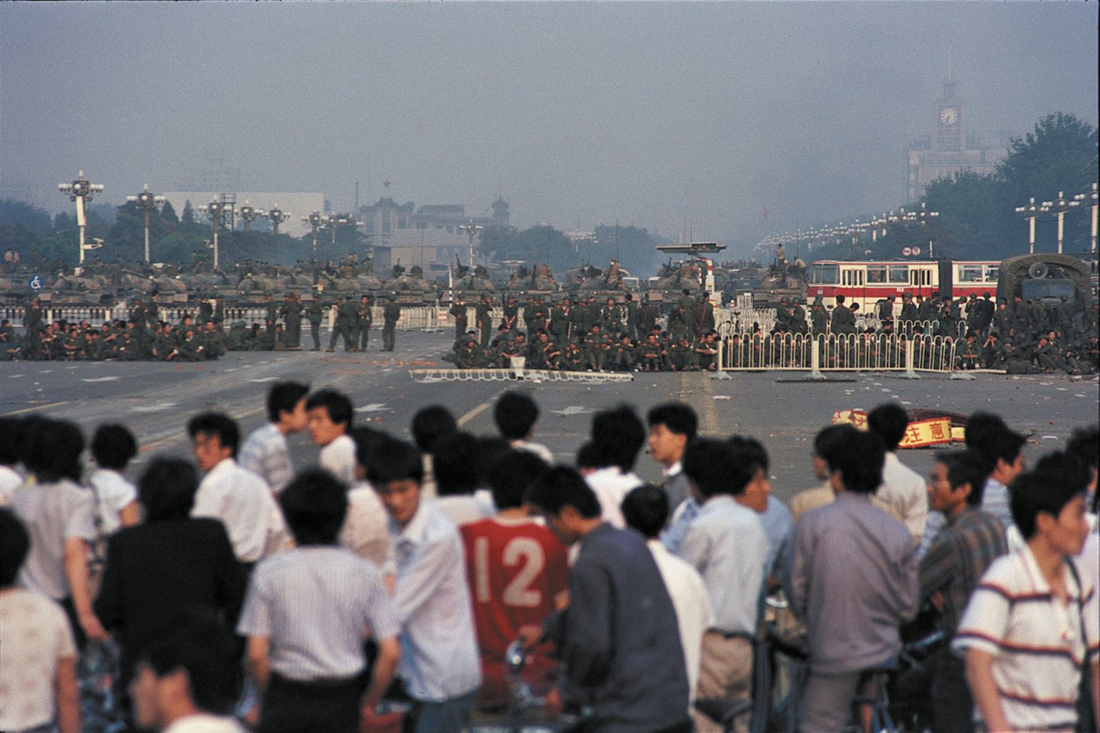 Demonstrators and troops during the Tiananmen Square protests. Image by Kao Bian. Beijing, 1989. Demonstrators and troops during the Tiananmen Square protests. Image by Kao Bian. Beijing, 1989.