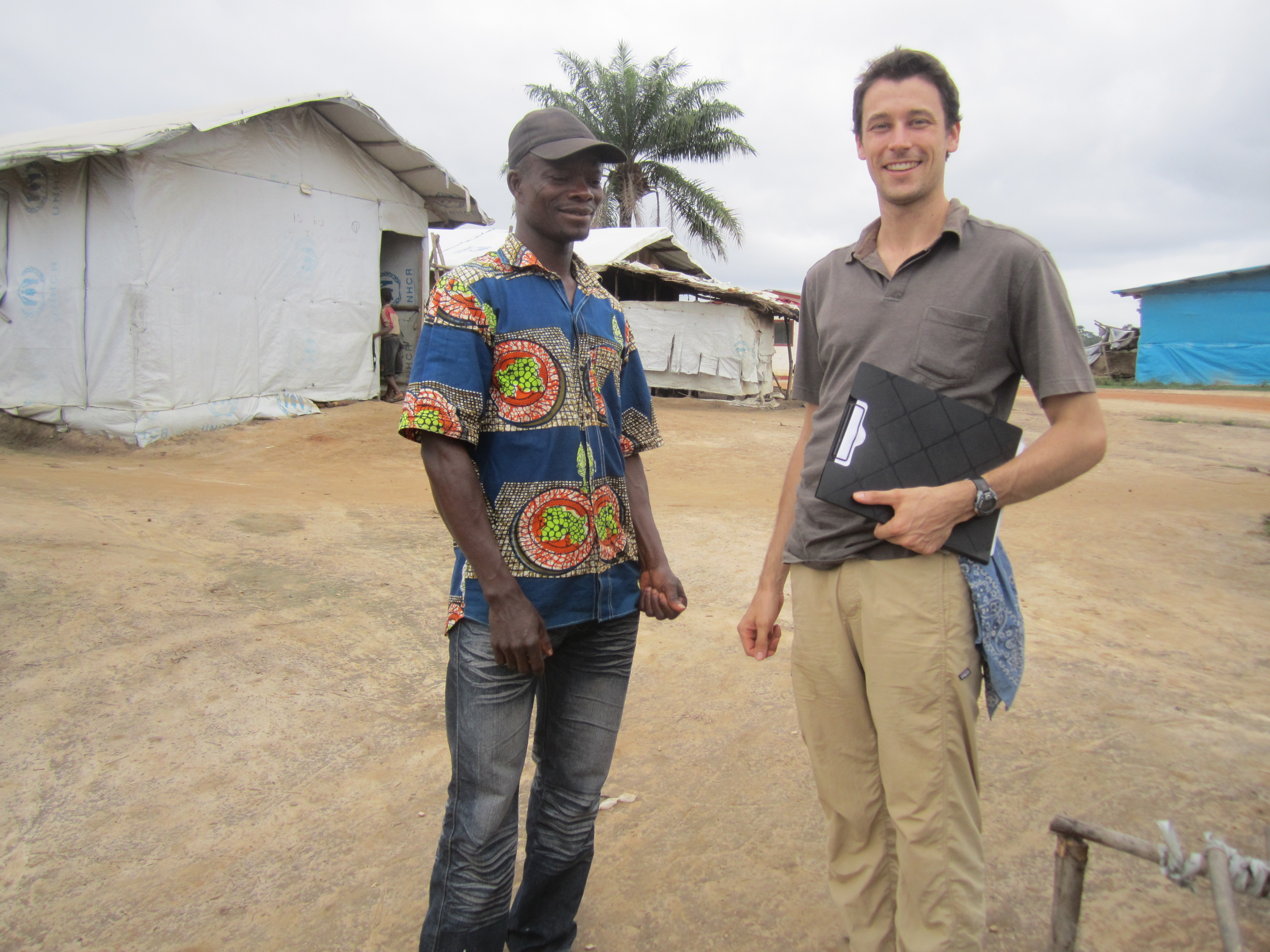 Ben Morse interviews an Ivorian refugee at the Gbahn refugee camp in Nimba County Liberia. Image contributed by Ben Morse. Liberia, 2015.