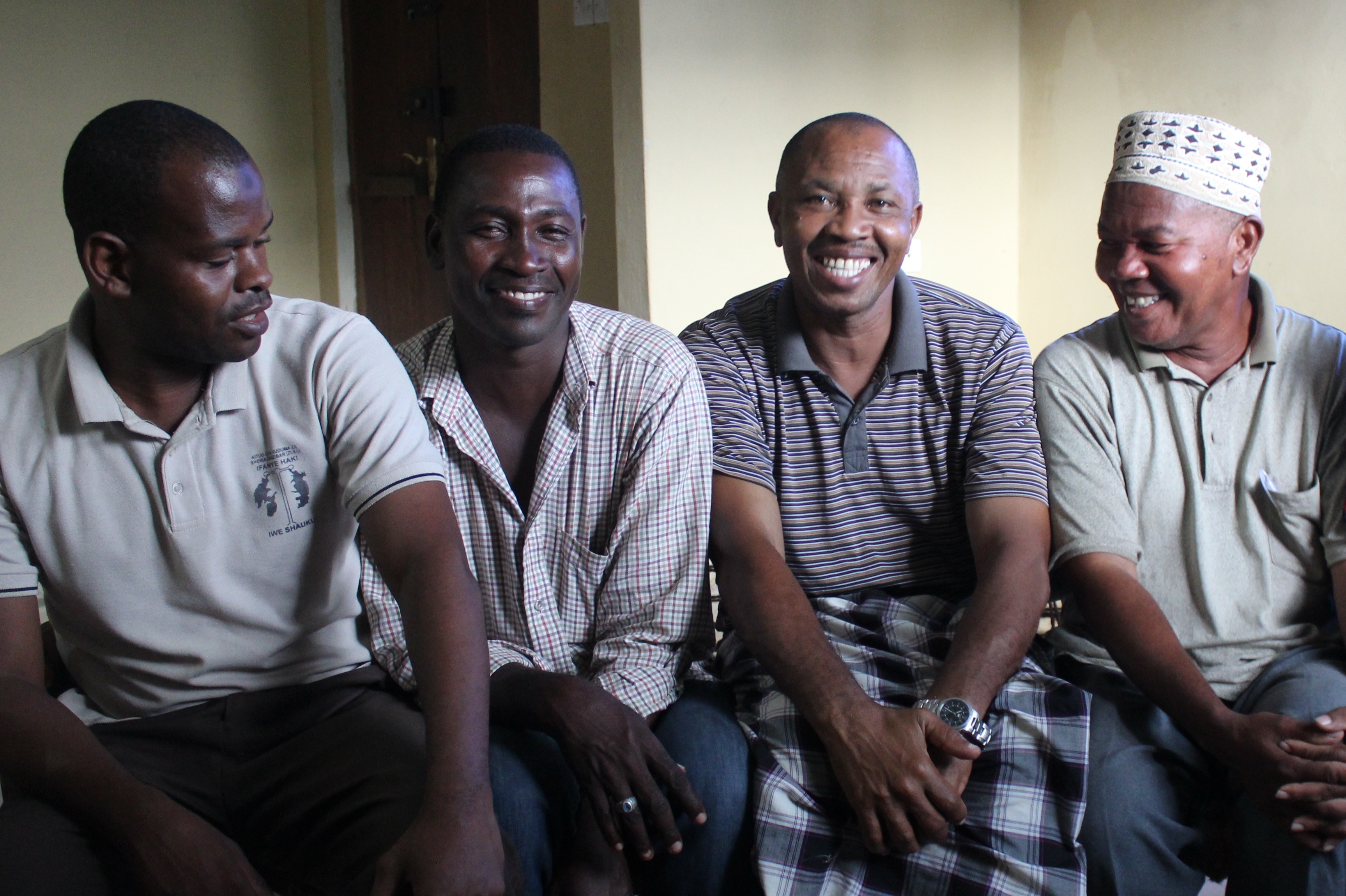 (L to R) Abushir Said Khatib, Hemedi Mwinchande Hemedi, Ali Makame Madaha, and Omar Mohammed Ali are members of the Zanzibar Rescue and Diving Community, a volunteer-based water rescue NGO. Image by Claire Felter. Zanzibar, 2015. Media file: img_0391.jpg