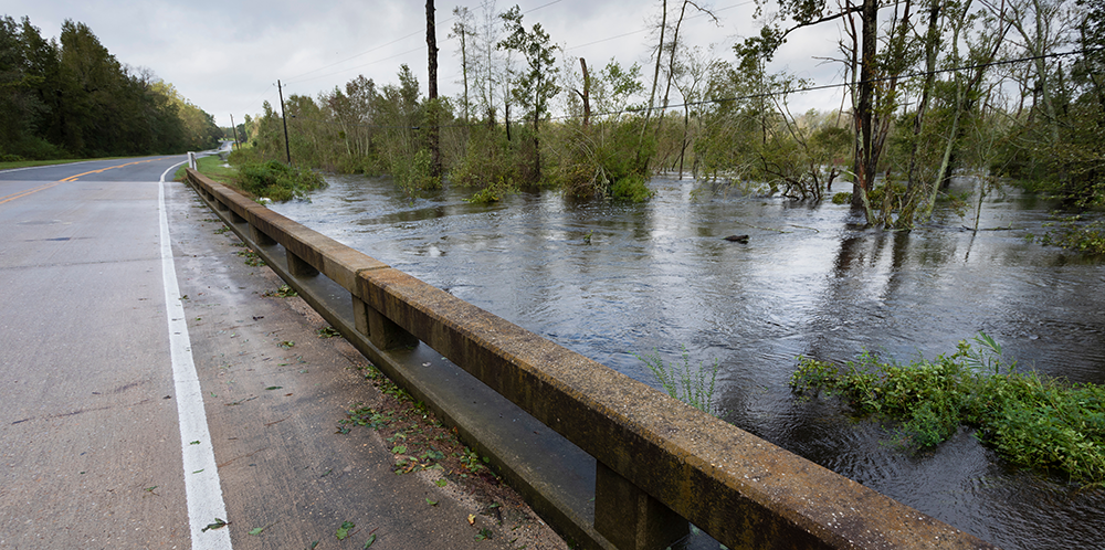 Water from Hurricane Florence rising under a bridge near Fayetteville, North Carolina. Image by Guy J. Sagi / Shutterstock.com. United States, 2018. Water from Hurricane Florence rising under a bridge near Fayetteville, North Carolina. Image by Guy J. Sagi / Shutterstock.com. United States, 2018.