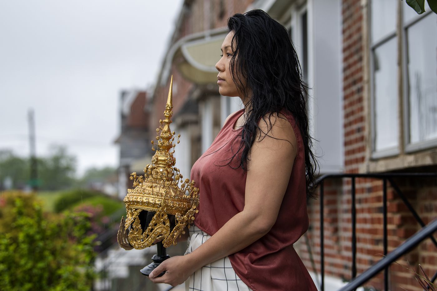 Catzie Vilayphonh is photographed holding a Laos folk crown near her home in Philadelphia, Pa. Friday, May 22, 2020. Vilayphonh is a poet who runs the community arts group Laos in the House. Image by Jose F. Moreno / The Philadelphia Inquirer. United States, 2020. Catzie Vilayphonh is photographed holding a Laos folk crown near her home in Philadelphia, Pa. Friday, May 22, 2020. Vilayphonh is a poet who runs the community arts group Laos in the House. Image by Jose F. Moreno / The Philadelphia Inquirer. United States, 2020.