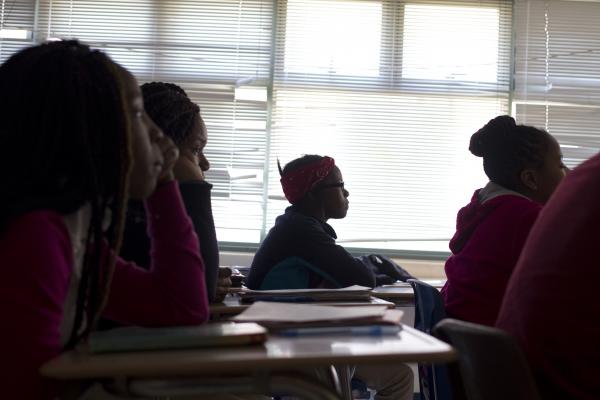 Students at the SEED school listen to journalist Brendan Hoffman speak about Russian monotowns. Image by Meghan Dhaliwal. Washington, D.C., 2014. Media file: img_3641.jpg