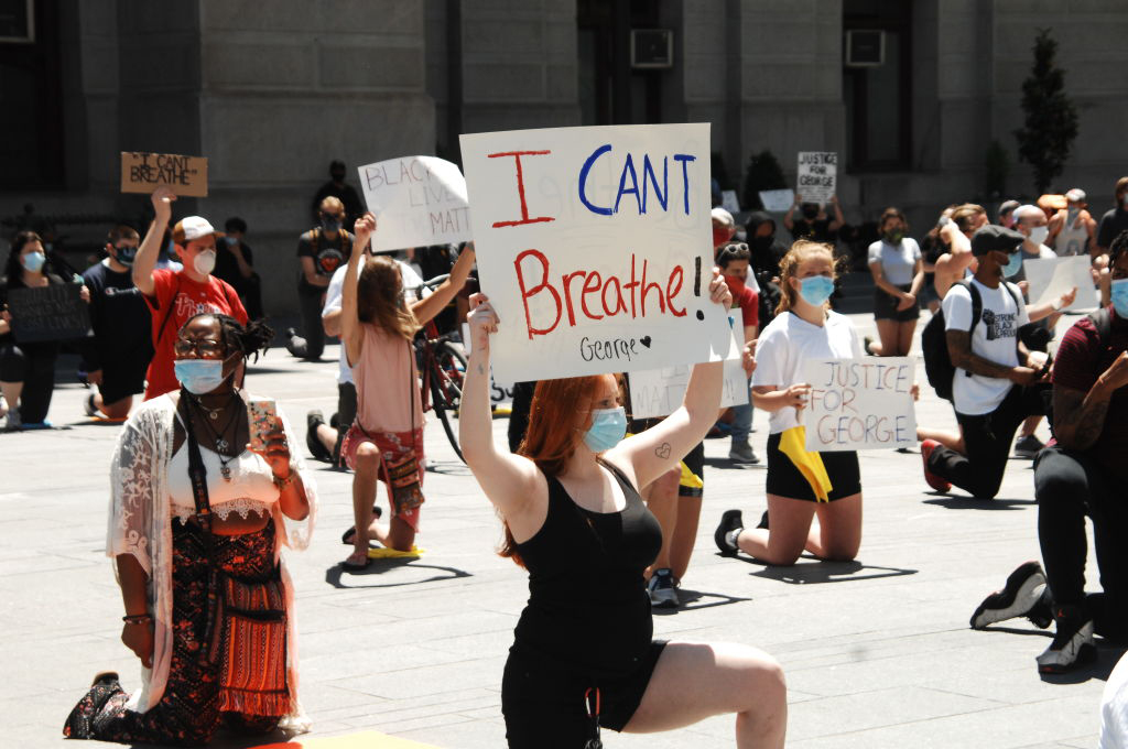 Hundreds of Philadelphians kneel in protest of system police violence and other forms of systemic racism in memory of George Floyd and other victims modern-day lynching at City Hall in Philadelphia, PA, on May 30, 2020. Image by Cory Clark/NurPhoto via Getty Images. United States, 2020. Hundreds of Philadelphians kneel in protest of system police violence and other forms of systemic racism in memory of George Floyd and other victims modern-day lynching at City Hall in Philadelphia, PA, on May 30, 2020. Image by Cory Clark/NurPhoto via Getty Images. United States, 2020.