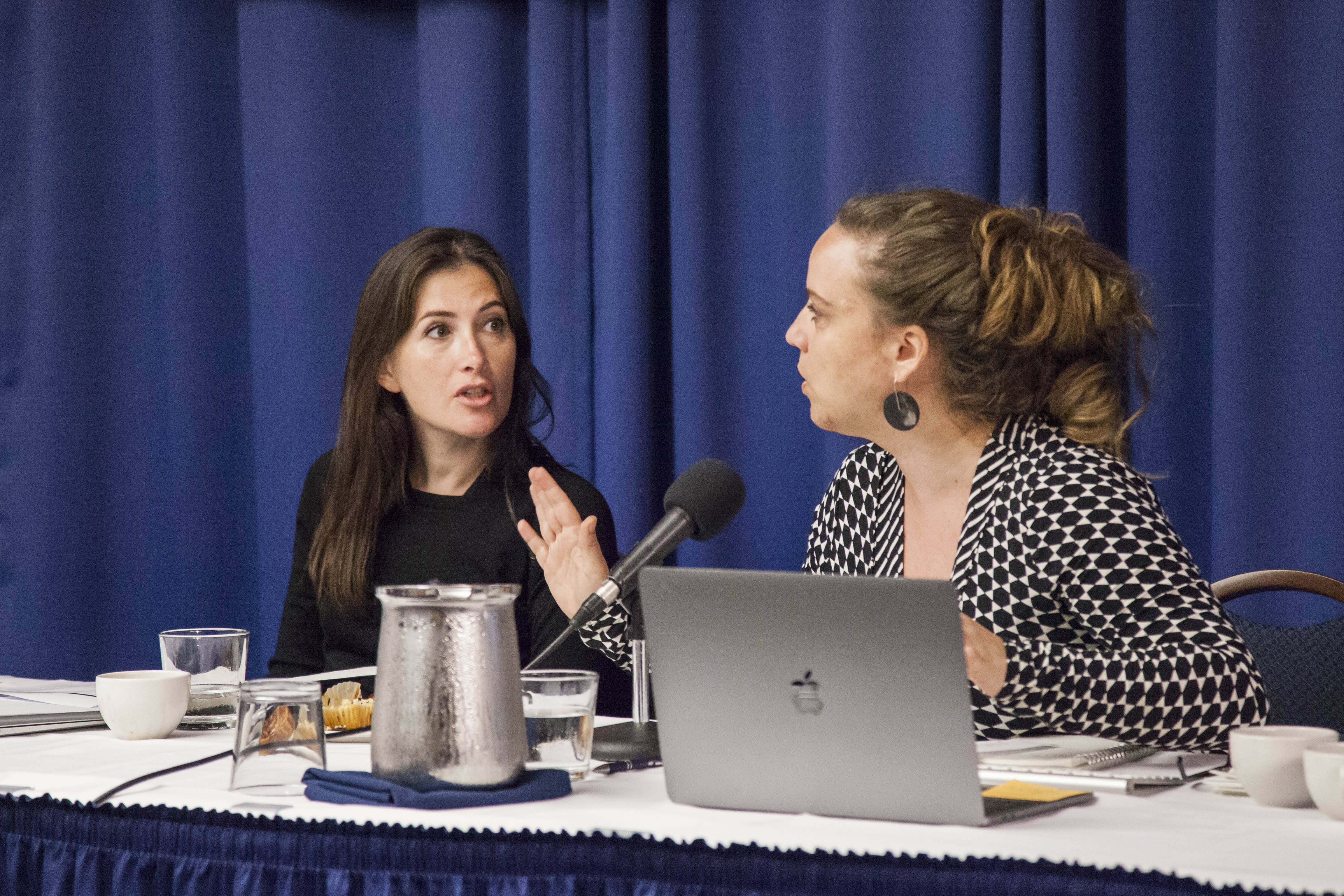 (Left to right) Pulitzer Center grantee journalists Cassandra Vinograd and Jina Moore discuss the challenges journalists face in covering conflicts and peacebuilding efforts. Image by Jin Ding. Washington, D.C., 2018. Media file: cassie_and_jina.jpg