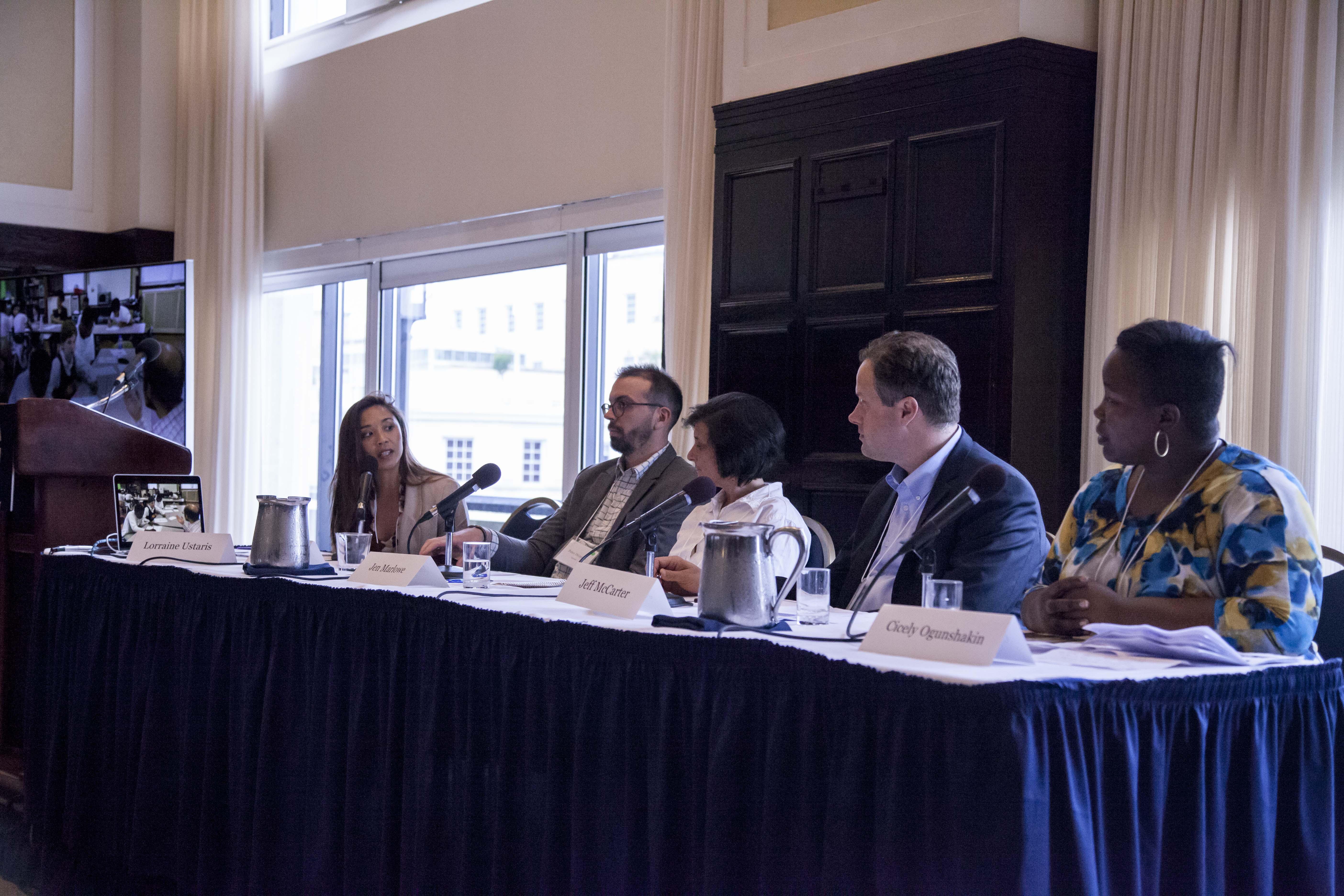 (Left to right) Lorraine Ustaris, Peter DiCampo, Jen Marlowe, Jeff McCarter, and Cicely Ogunshakin speak during the Global Education as Peacebuilding panel at the Pulitzer Center Beyond War conference. Image by Jin Ding. Washington, D.C., 2018. Media file: panel_edu.jpg