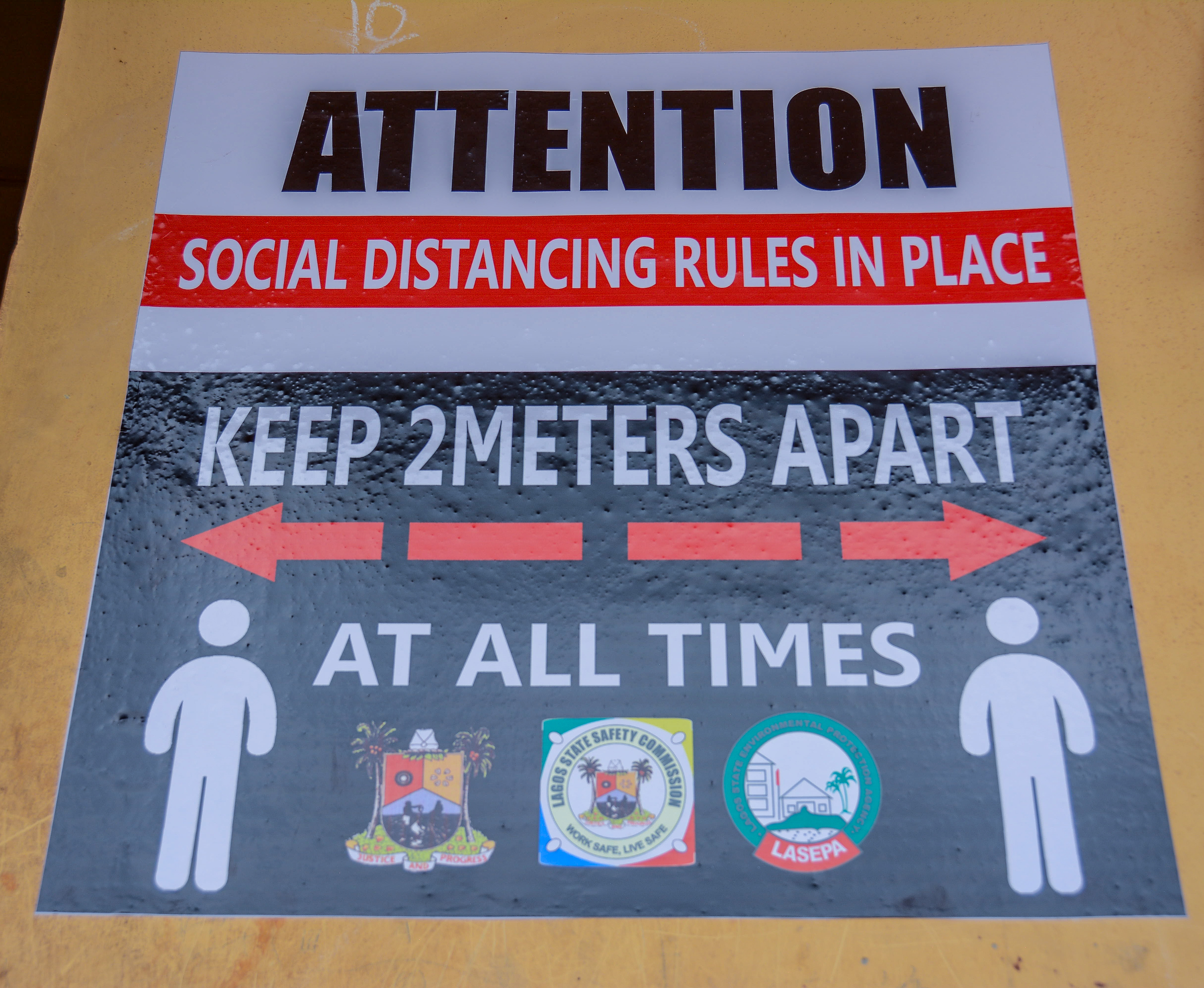 A poster on social distancing in a school in Lagos. Image by Oluwafemi Dawodu / Shutterstock. Nigeria, 2020. A poster on social distancing in a school in Lagos. Image by Oluwafemi Dawodu / Shutterstock. Nigeria, 2020.