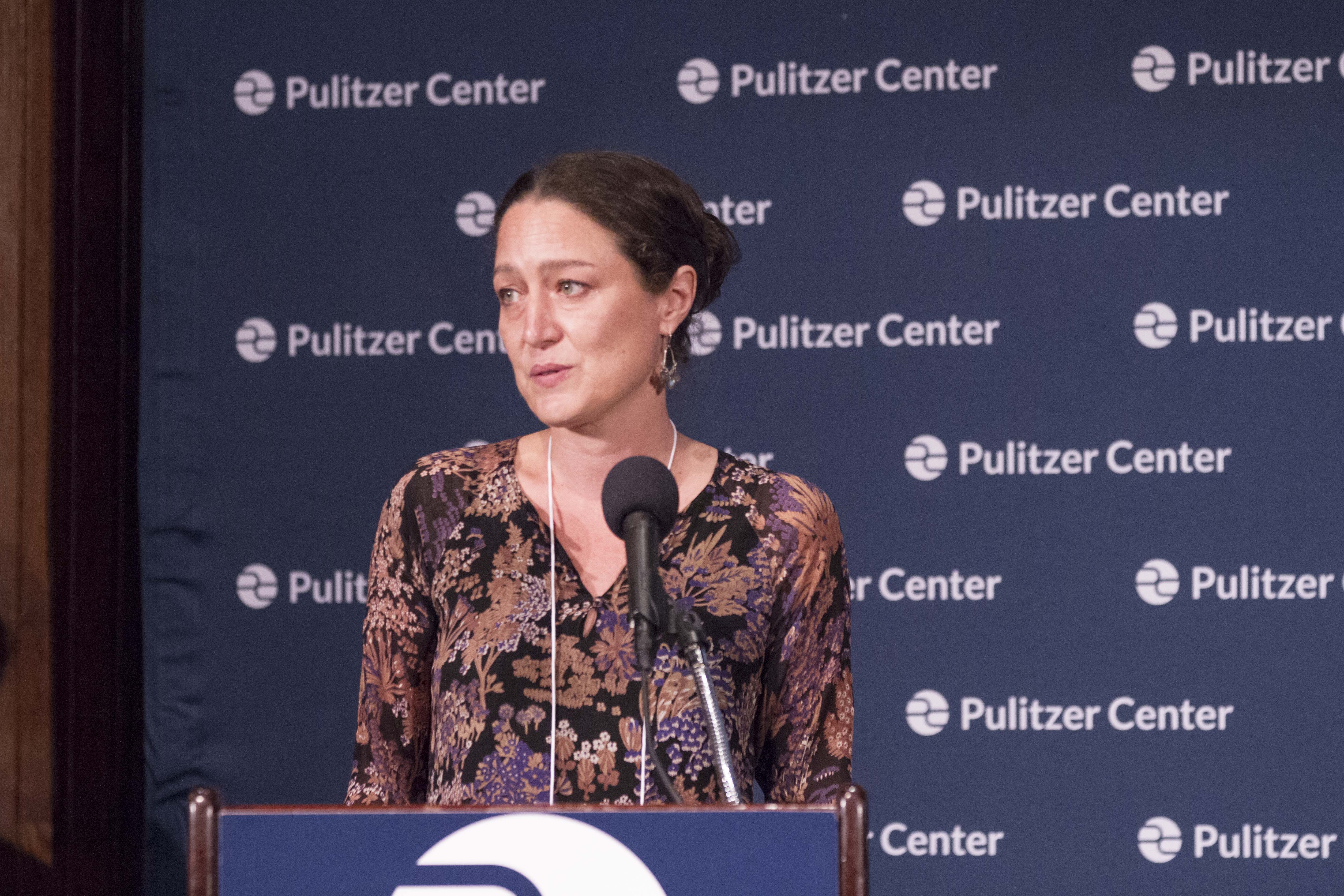 Managing Director of the Pulitzer Center Nathalie Applewhite makes the opening remarks at the Beyond War Conference on June 2. Image by Jin Ding. United States, 2018. Managing Director of the Pulitzer Center Nathalie Applewhite makes the opening remarks at the Beyond War Conference on June 2. Image by Jin Ding. United States, 2018.