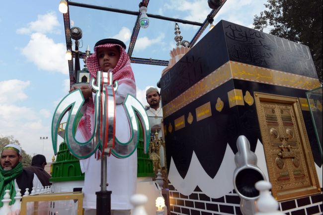 A replica of the Kaaba, the Grand Mosque in the holy city of Mecca, was crafted as part of Eid Milad-un-Nabi, the celebration of the birth of the Prophet Mohammed. The celebration took place in Lahore on January 14, 2014. Image from GlobalPost. Saudi Arabia, 2014. Media file: islam.jpg