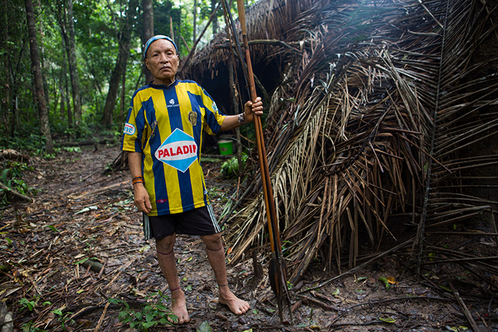 Epa is a liaison between Peru's isolated Indigenous tribes and the modern world. He lives with three wives, a mother-in-law, and many dogs in a hand-built shelter along the Curanja River in the Purús Communial Reserve. Image by Jason Houston. Peru, 2015. Media file: science_0.png