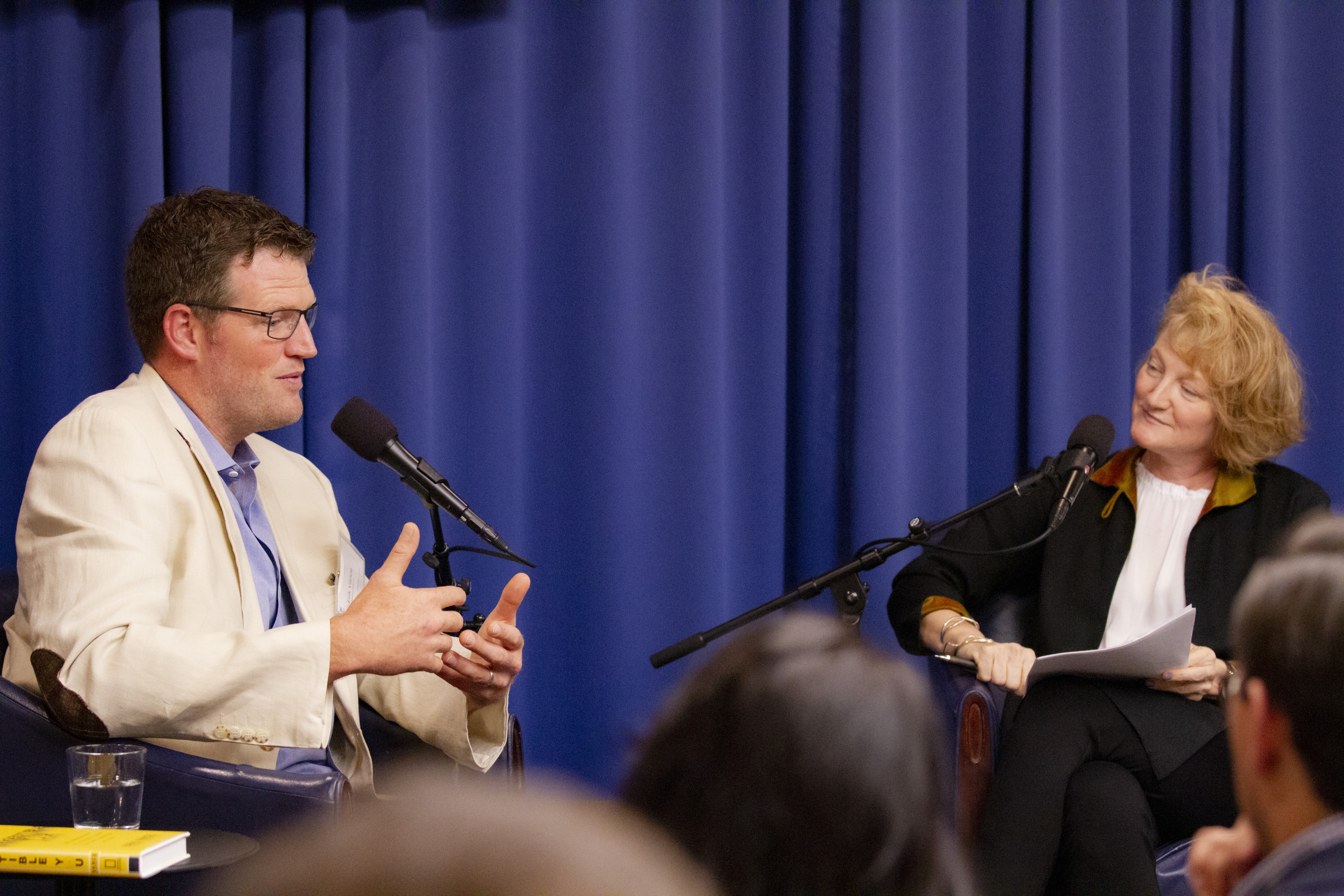 Grantee Erik Vance and On Being radio host Krista Tippett discuss ways to bridge the gap between science and religion. Image by Jin Ding. Washington, D.C., 2019. Grantee Erik Vance and On Being radio host Krista Tippett discuss ways to bridge the gap between science and religion. Image by Jin Ding. Washington, D.C., 2019.