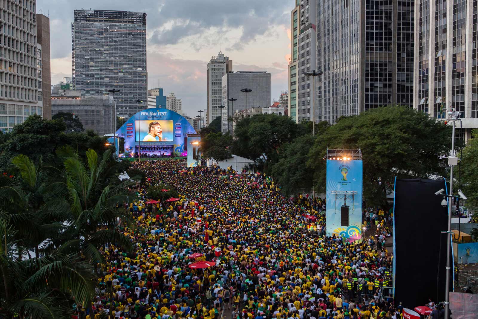 Fans congregate at the FIFA Fan Fest during the opening Brazilian match. Image by Matthew Niederhauser. Brazil, 2014.
