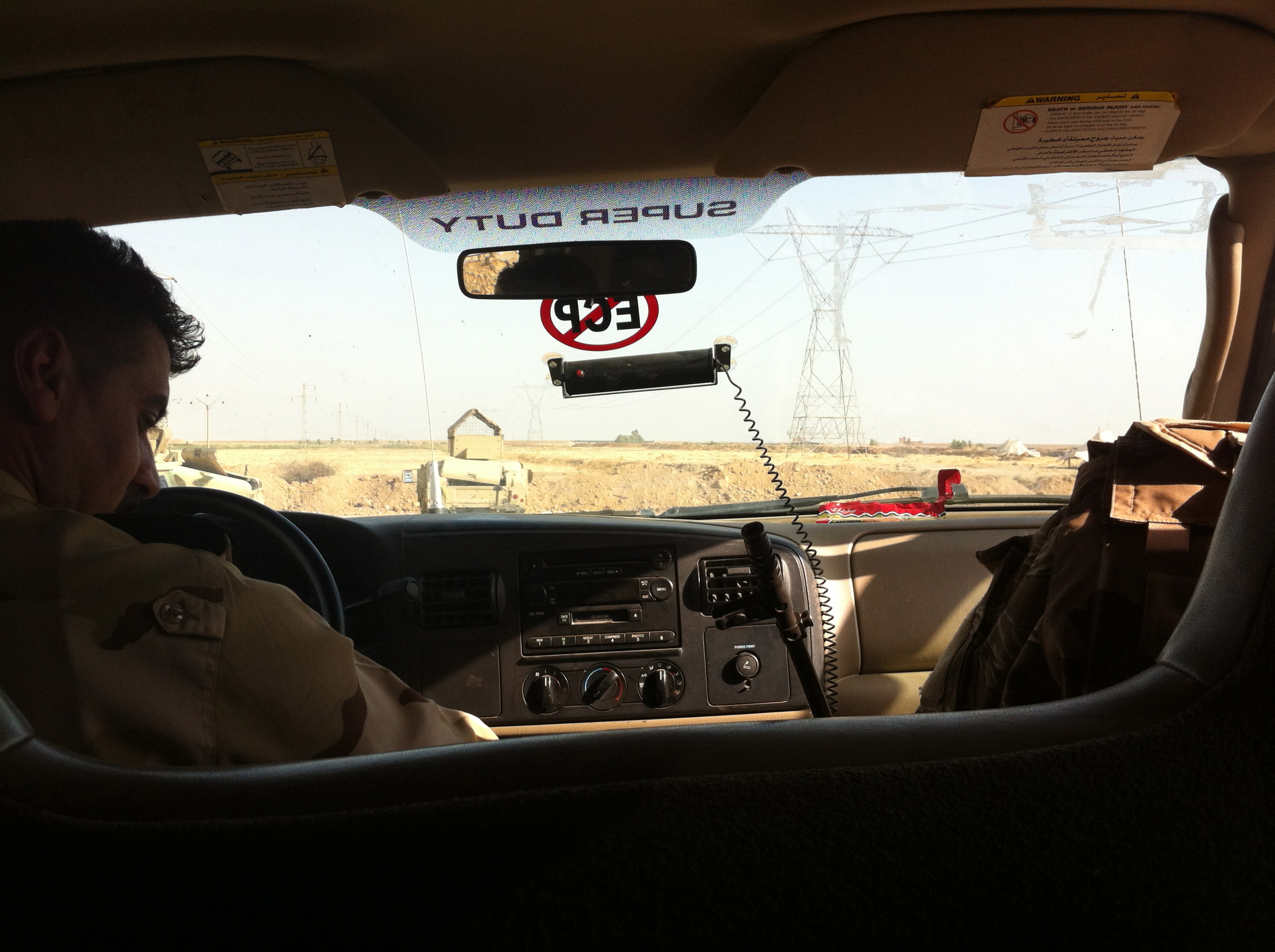 A peshmerga on duty in Kirkuk. Image by Jenna Krajeski. Iraq, 2014. Media file: img_1965.jpg