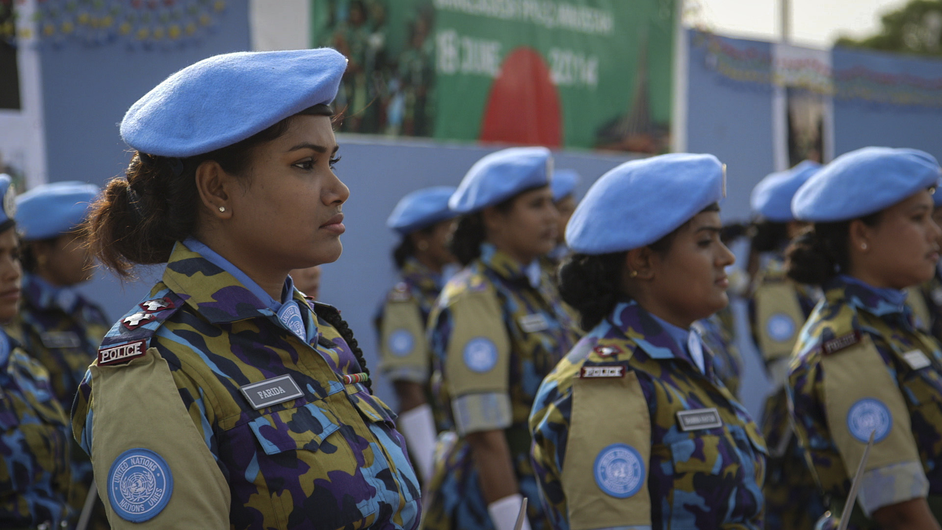 Farida Parveen, a foot soldier from Bangladesh, stands in line. Farida Parveen, a foot soldier from Bangladesh, stands in line.