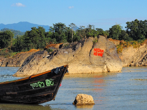 Graffiti near the Myitsone Dam. Image by Doug Bock Clark. Myanmar, 2017. Graffiti near the Myitsone Dam. Image by Doug Bock Clark. Myanmar, 2017.