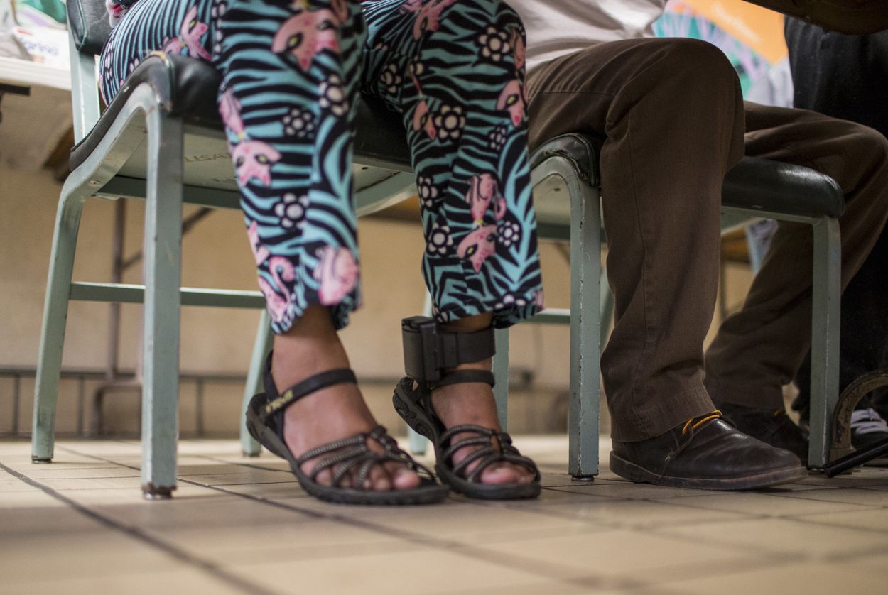 An ankle monitor on Miriam, who did not want to release her last name, during a press conference at the Casa Vides Annunciation House immigrant shelter on Monday, June 25, 2018, in El Paso. Image by Ivan Pierre Aguirre for the Texas Tribune. United States, 2018. An ankle monitor on Miriam, who did not want to release her last name, during a press conference at the Casa Vides Annunciation House immigrant shelter on Monday, June 25, 2018, in El Paso. Image by Ivan Pierre Aguirre for the Texas Tribune. United States, 2018.