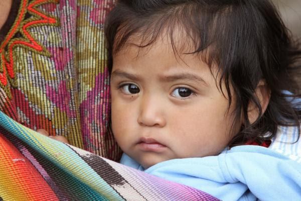 In the western highlands of Guatemala, more than 70 percent of children in some communities are so malnourished that their physical and mental growth is “stunted.” At 21 months, Lidia Chumil is nearly 4 pounds lighter and 3 inches shorter than the recommended average for children her age. Image by Hari Sreenivasan/PBS NewsHour. Guatemala, 2014. Media file: guatemala.jpg