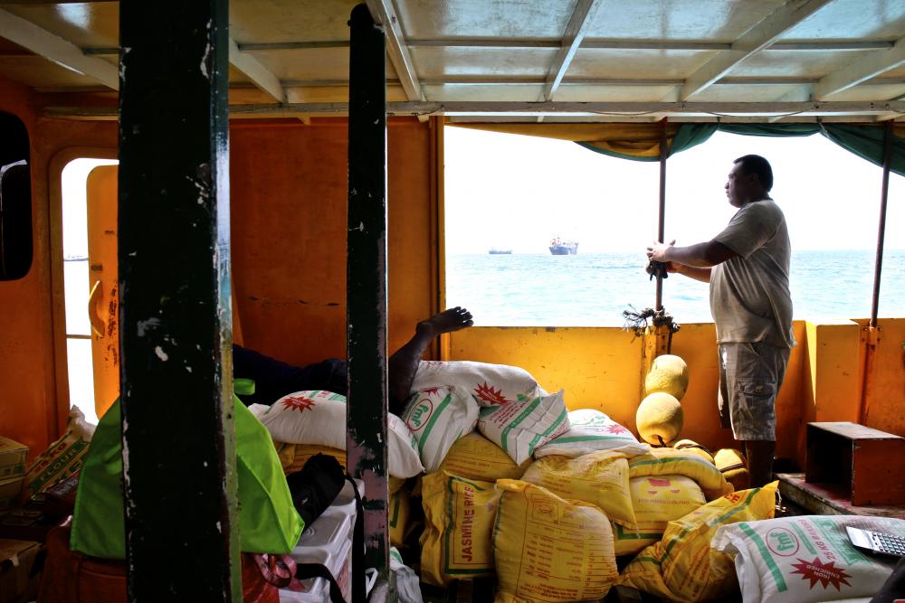 Imported rice and flour are staples in isolated islands as local food sources are becoming inundated. Image by Janice Cantieri. Kiribati, 2014.