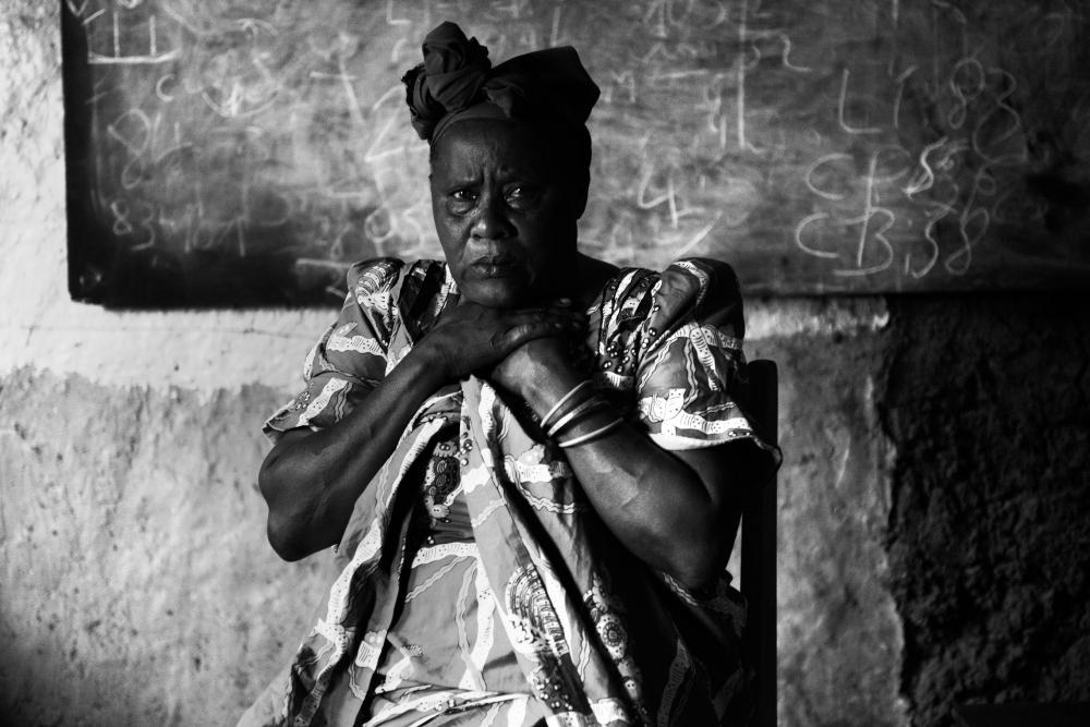 Nzigire Chibalonza, 60, was raped by three men in November 2012 in the Democratic Republic of Congo. They were so brutal, she says, "I thought I would die." Image by Fiona Lloyd-Davies. DRC, 2013.