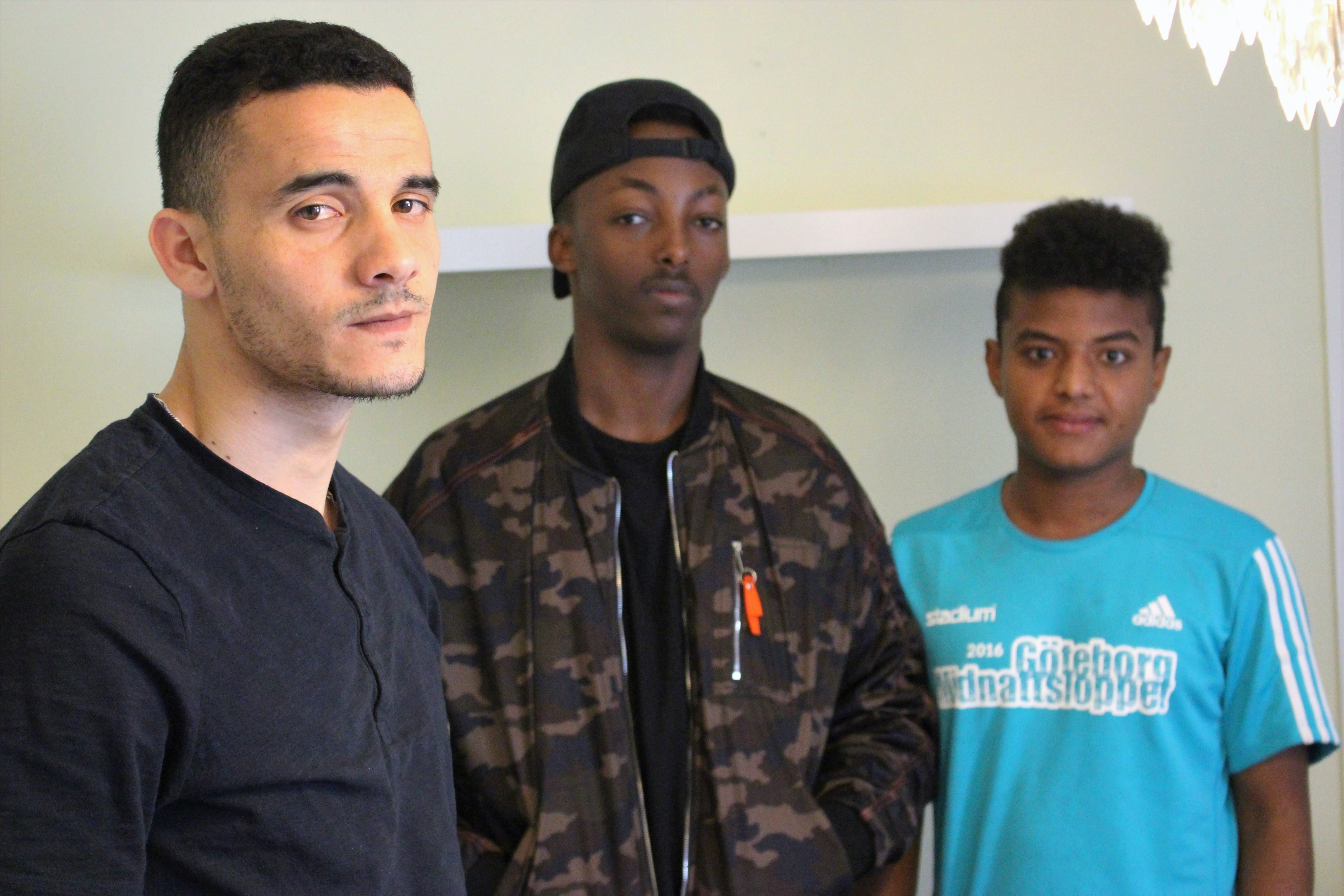 From left to right: Marwan, 16, from Mauritania by way of Morocco, Khalid, 15, from Ethiopia and Amar, 15, from Eritrea, in a Mölndal youth asylum center. Each is awaiting asylum. Image by Amy Russo. Sweden, 2017. From left to right: Marwan, 16, from Mauritania by way of Morocco, Khalid, 15, from Ethiopia and Amar, 15, from Eritrea, in a Mölndal youth asylum center. Each is awaiting asylum. Image by Amy Russo. Sweden, 2017.