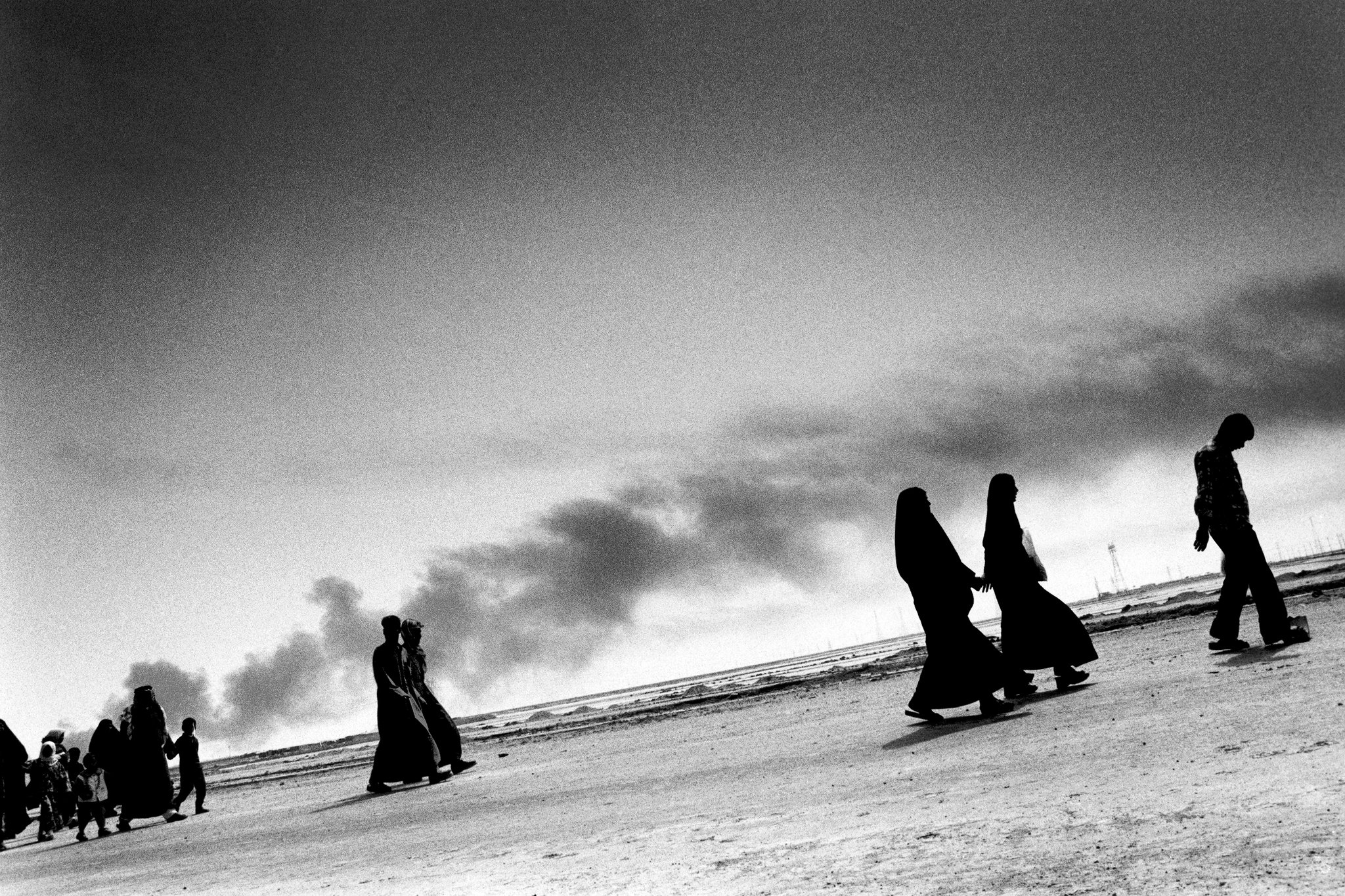 Civilians fleeing Basra. Image by Paolo Pellegrin. Iraq, 2003. Civilians fleeing Basra. Image by Paolo Pellegrin. Iraq, 2003.