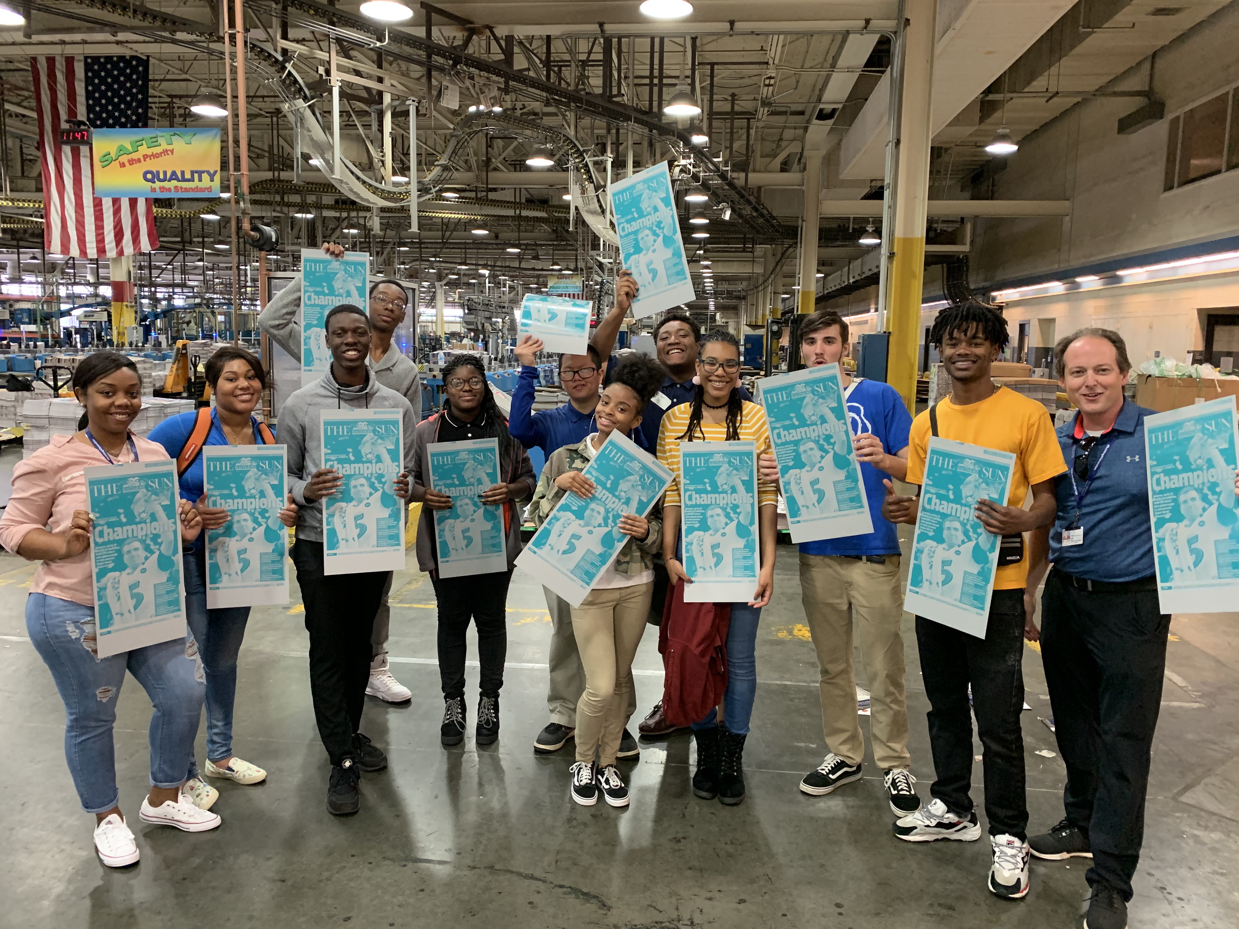 High school students from the Baltimore City Public Schools Student Media Team tour the printing and distribution centers for the Baltimore Sun. Image by Fareed Mostoufi. United States, 2019. Media file: image-1_1.png