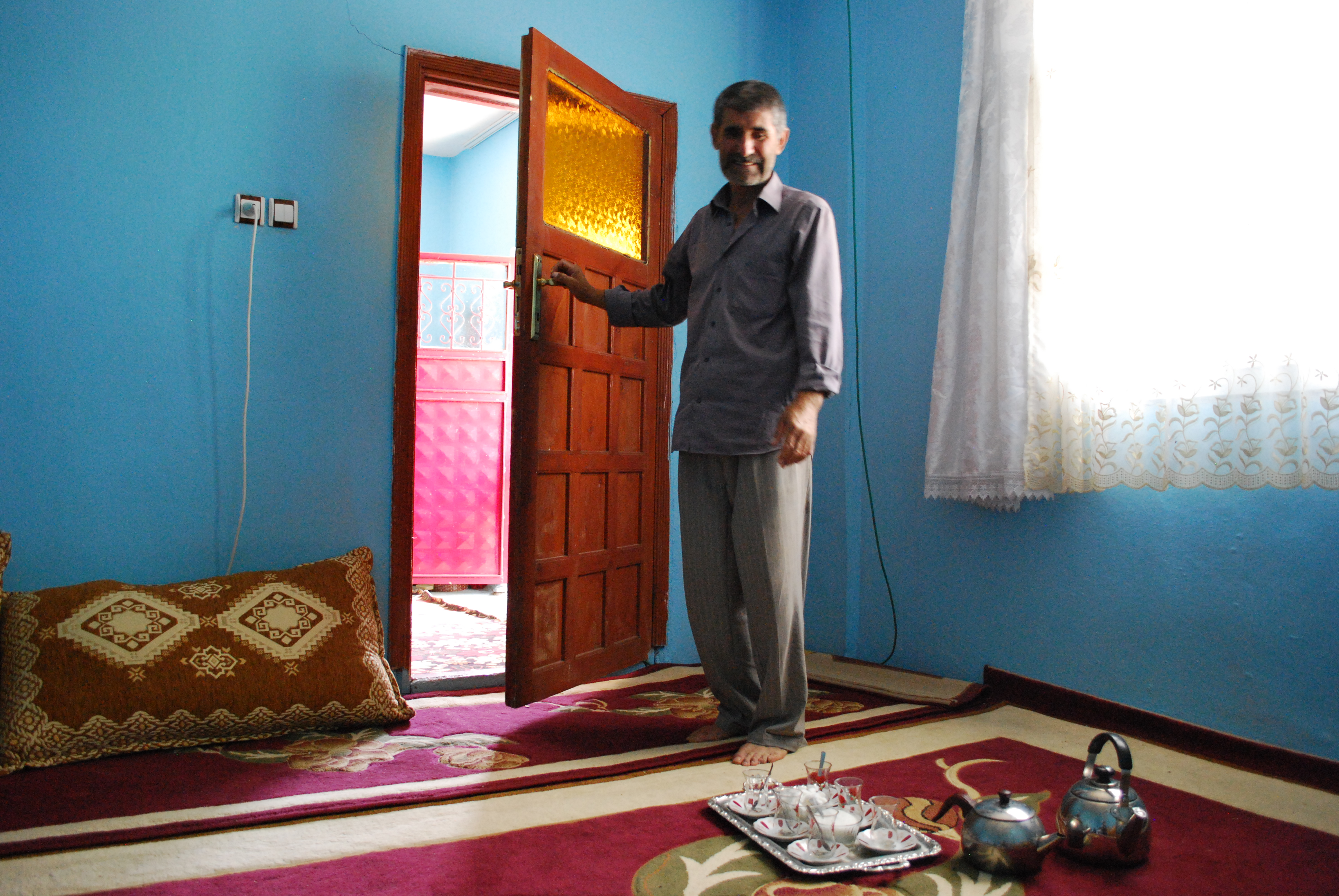 Atilla, a farmer and former truck driver in Silopi, where the border crossing with Iraq is a lifeline for Kurds living there. Image by Jenna Krajeski. Turkey, 2013. Media file: dsc_0941.jpg