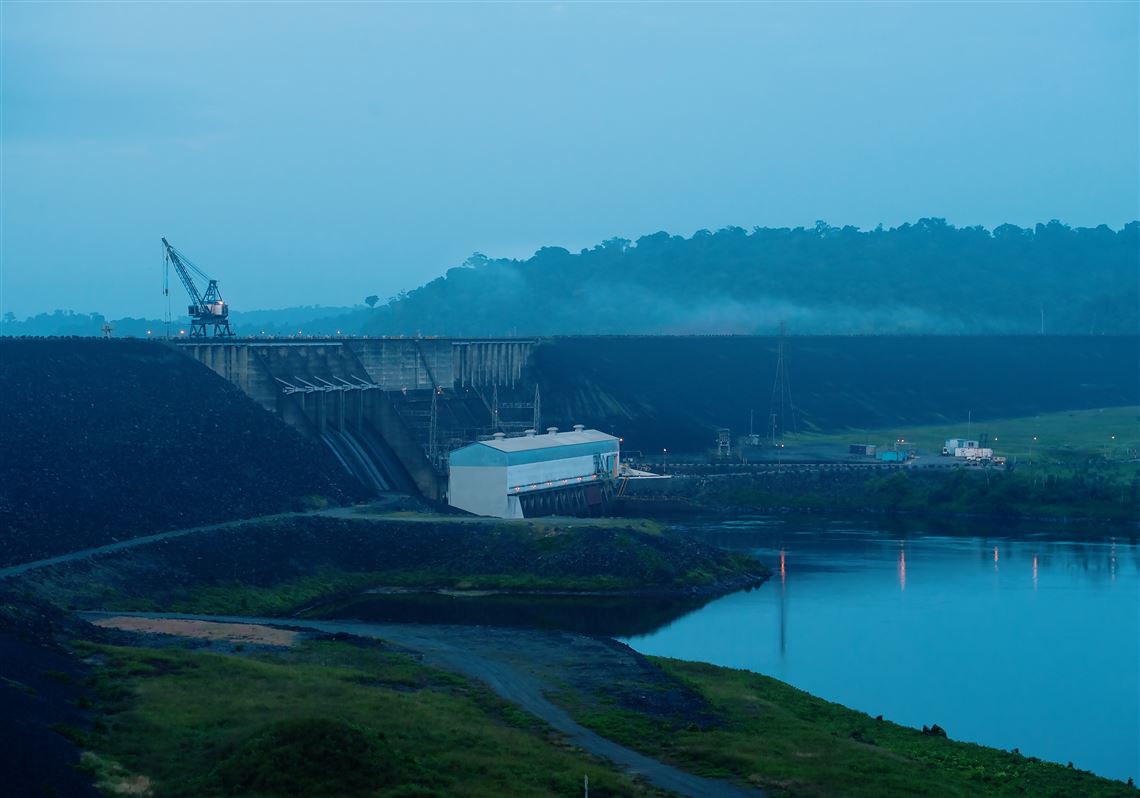 The Afrobaka Dam at dawn in Suriname on Sunday, March 12, 2017. Image by Stephanie Strasburg. Suriname, 2017. The Afrobaka Dam at dawn in Suriname on Sunday, March 12, 2017. Image by Stephanie Strasburg. Suriname, 2017.