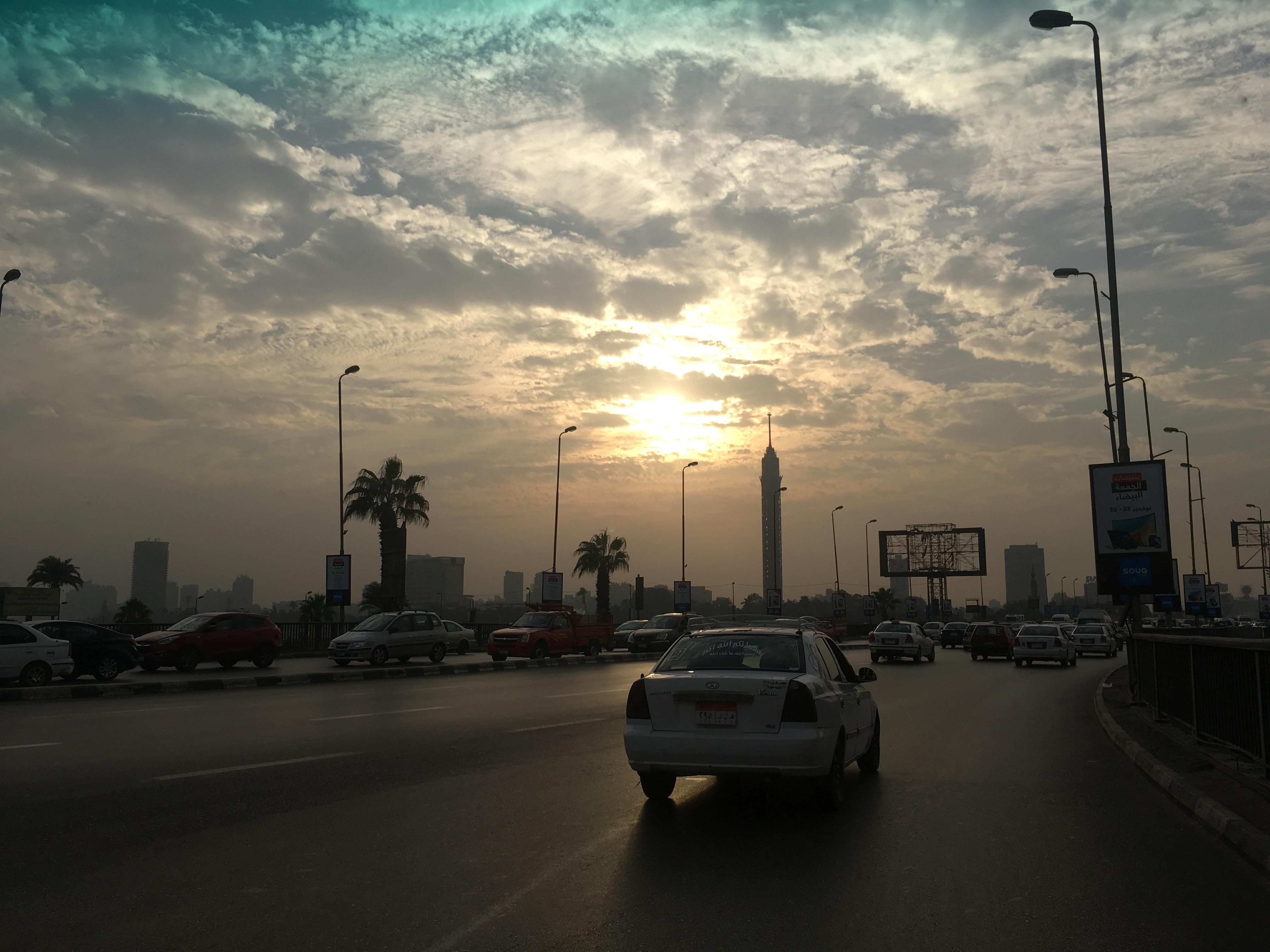 Commuters on Cairo's 6 October Bridge Cairo's 6 October Bridge is shorthand for traffic. Commuters will plan their whole day around whether the fly-over that stretches half the length of Cairo proper is gridlocked. Image by Jahd Khalil. Egypt, 2017.
