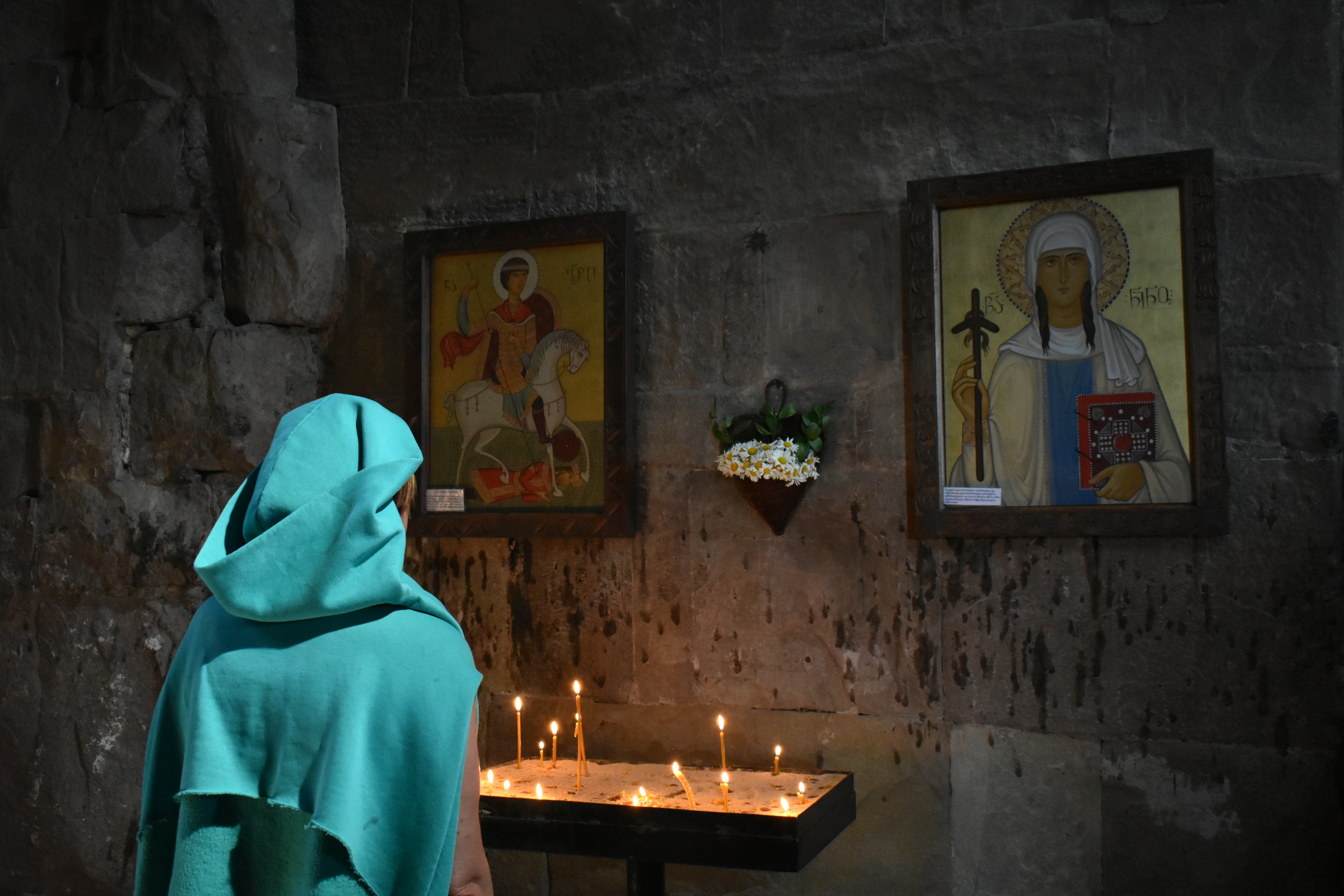 An Orthodox woman prays at the Jvari Monastery. Image by Kaitlyn Johnson. Georgia, 2019. An Orthodox woman prays at the Jvari Monastery. Image by Kaitlyn Johnson. Georgia, 2019.